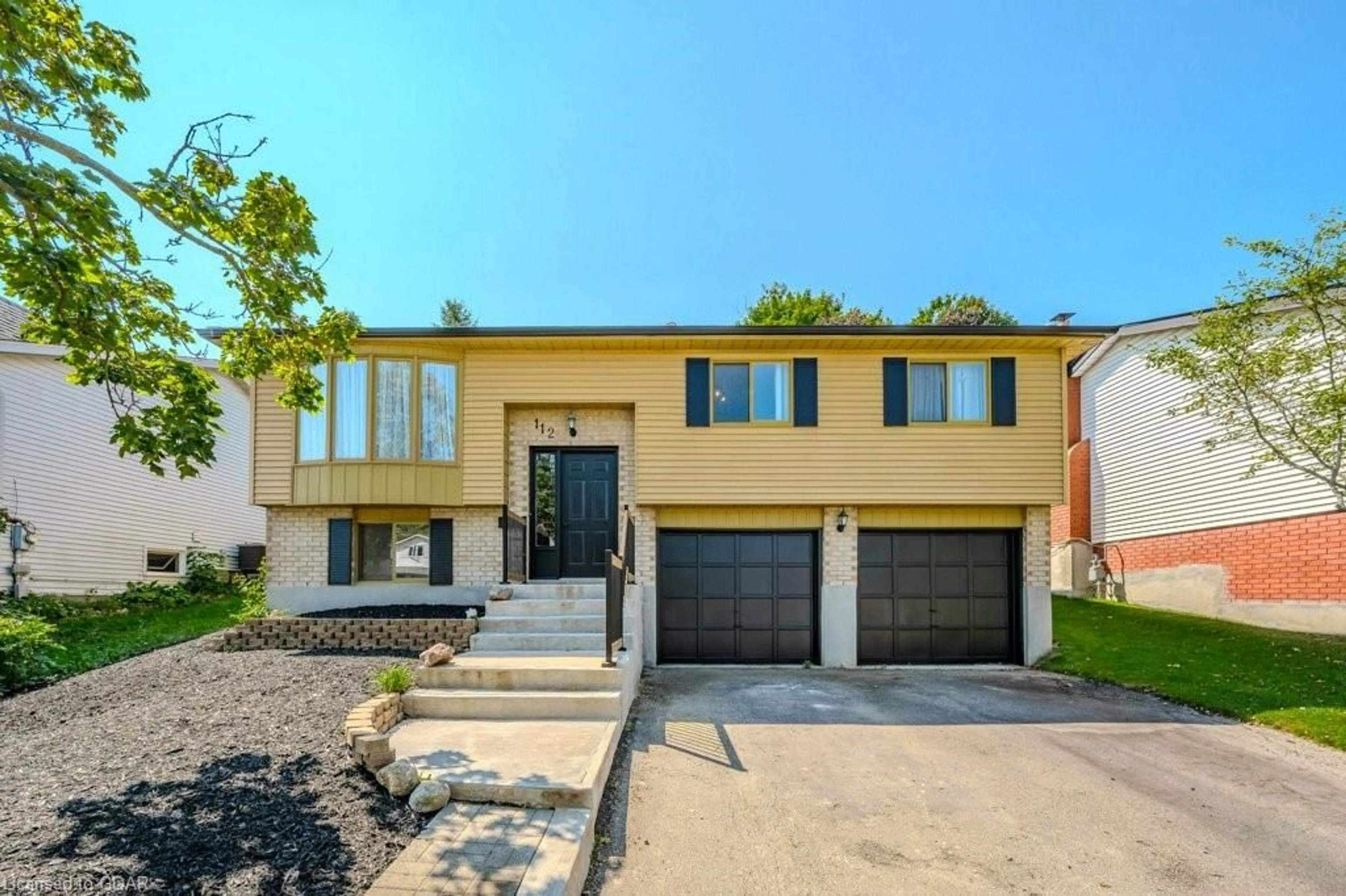 Frontside or backside of a home, the street view for 112 Freshmeadow Way, Guelph Ontario N1K 1P9