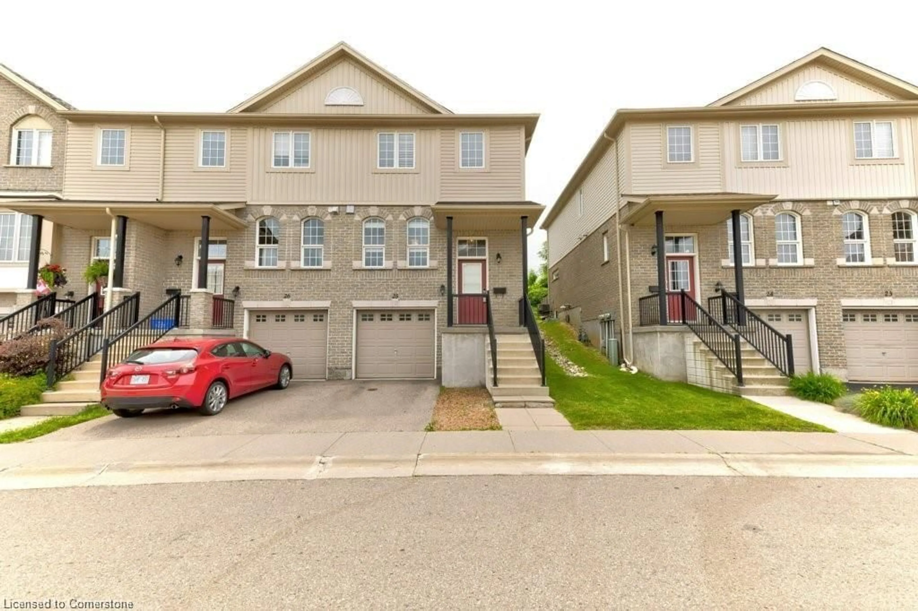 A pic from exterior of the house or condo, the street view for 105 Pinnacle Dr #25, Kitchener Ontario N2P 1B8