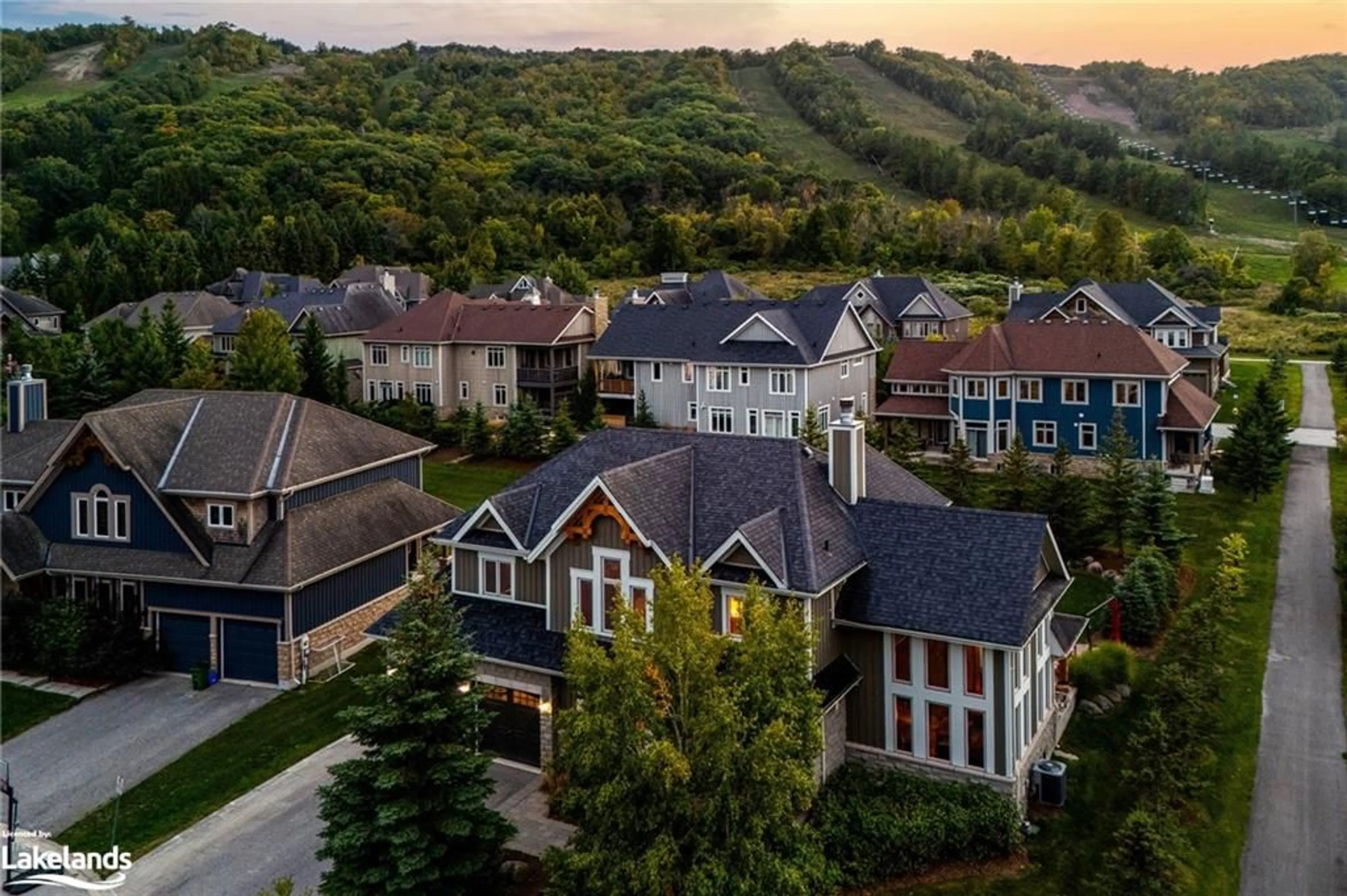 A pic from exterior of the house or condo, the view of city buildings for 106 Manitou Crt, The Blue Mountains Ontario L9Y 0B6