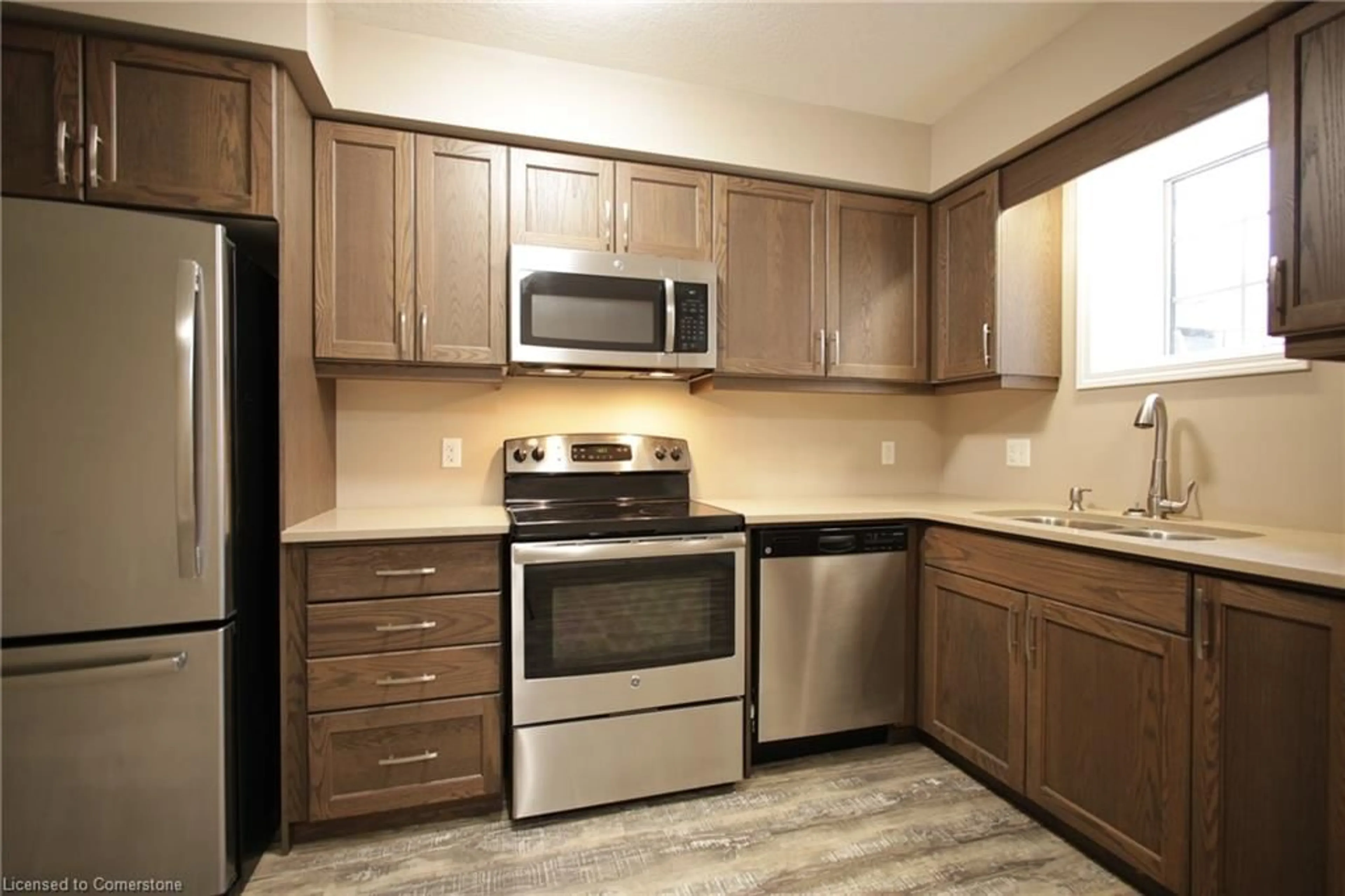 Standard kitchen, wood floors, cottage for 388 Old Huron Rd #24D, Kitchener Ontario N2R 0J5