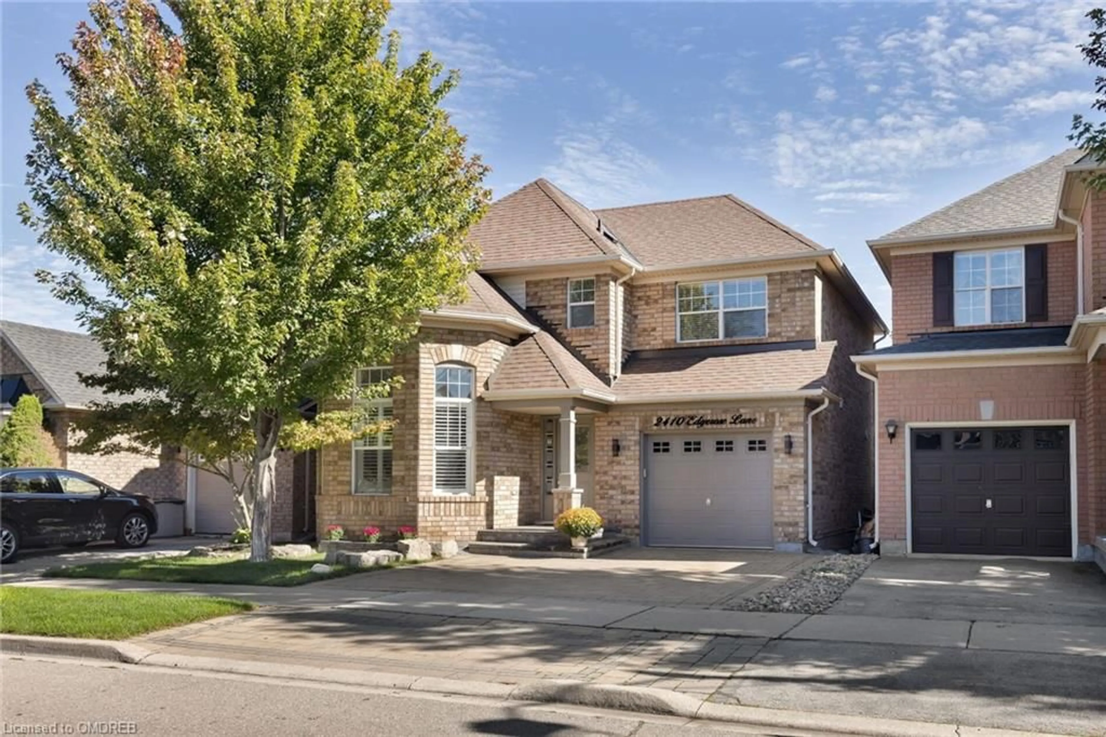 Frontside or backside of a home for 2410 Edgerose Lane, Oakville Ontario L6M 4X5