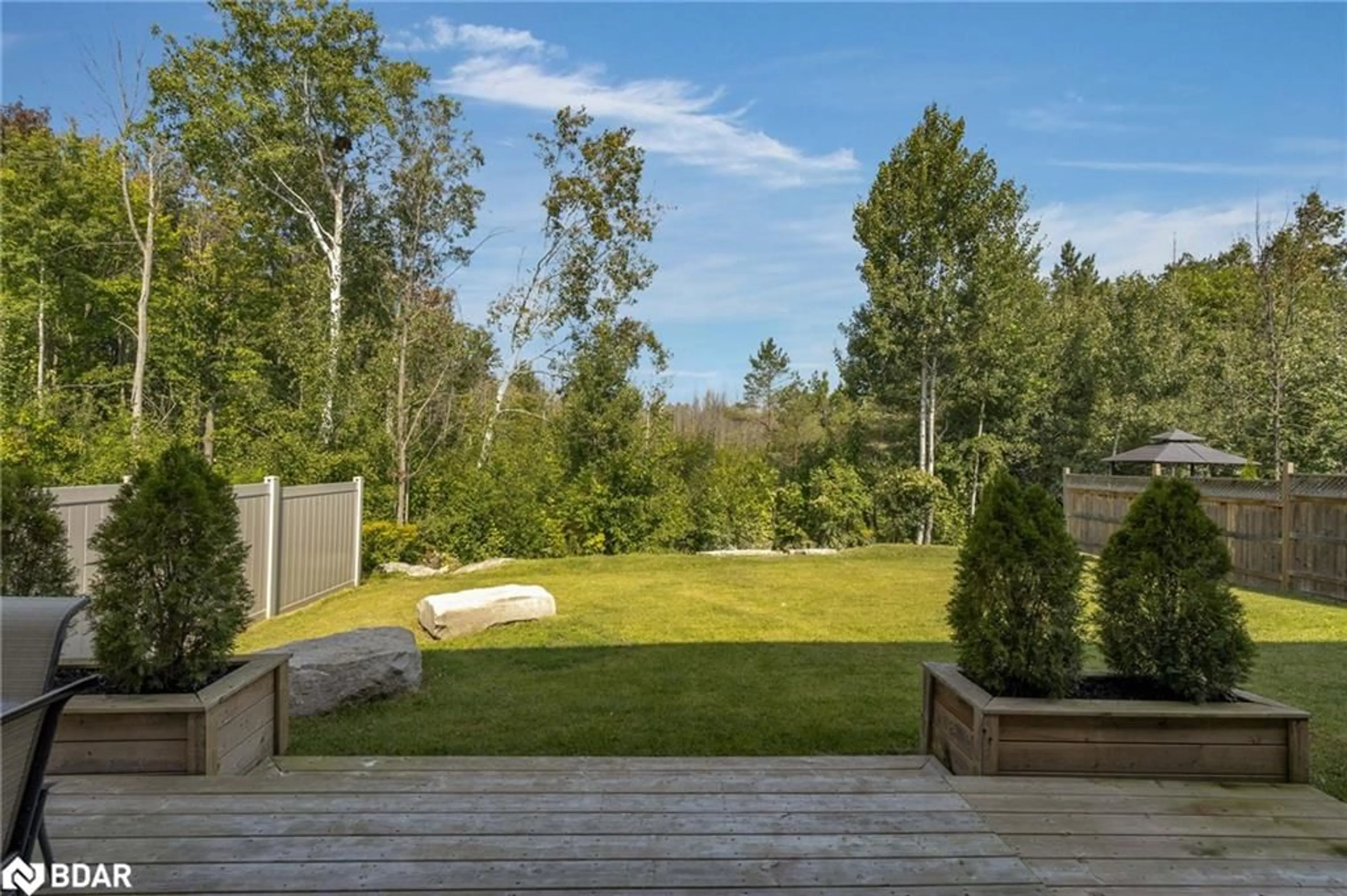 Patio, the fenced backyard for 37 Sheppard Drive Dr, Victoria Harbour Ontario L0K 2A0