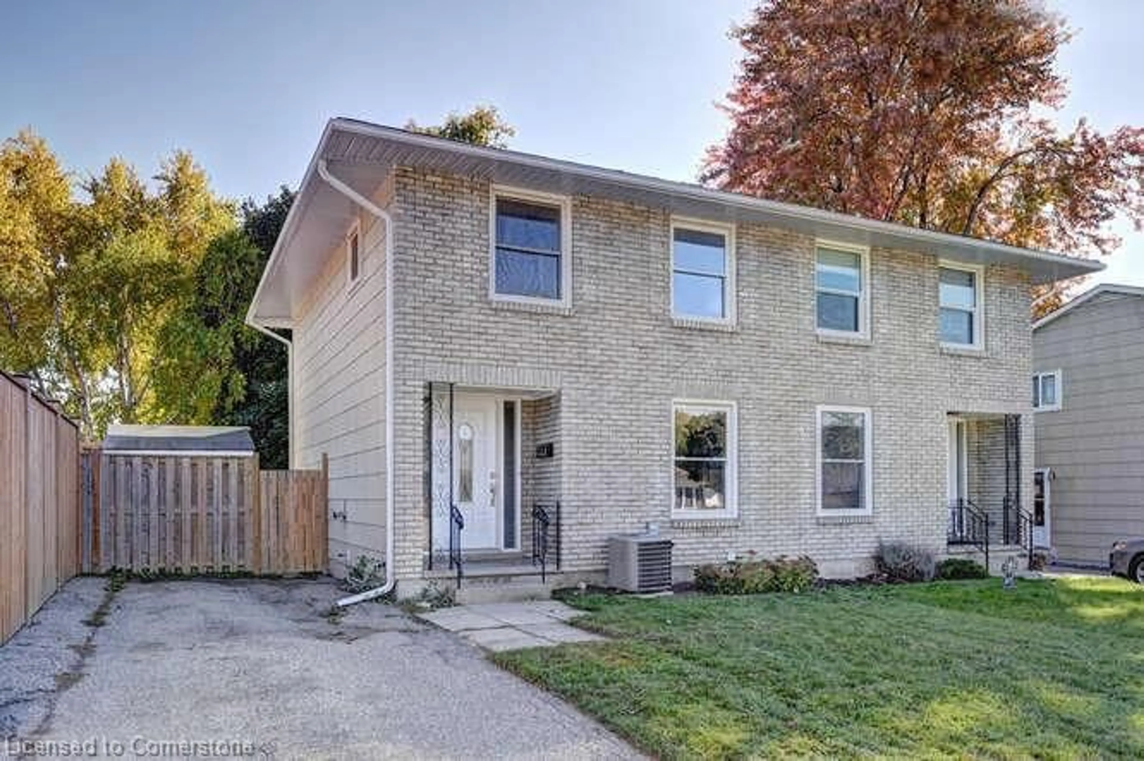 Frontside or backside of a home, the fenced backyard for 144 Greendale Cres, Kitchener Ontario N2A 2R6