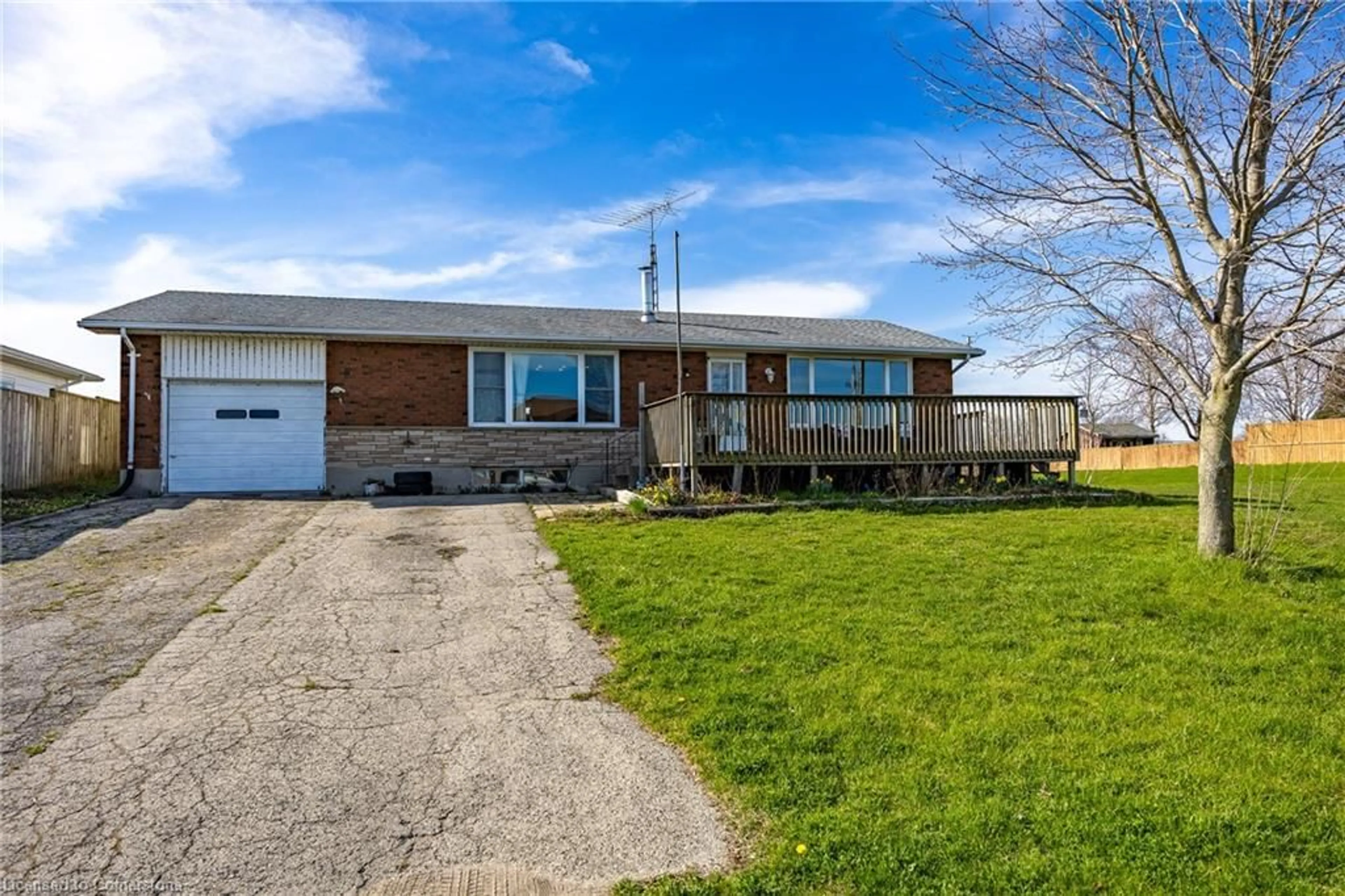 Frontside or backside of a home, cottage for 48 Bee St, St. Williams Ontario N0E 1P0