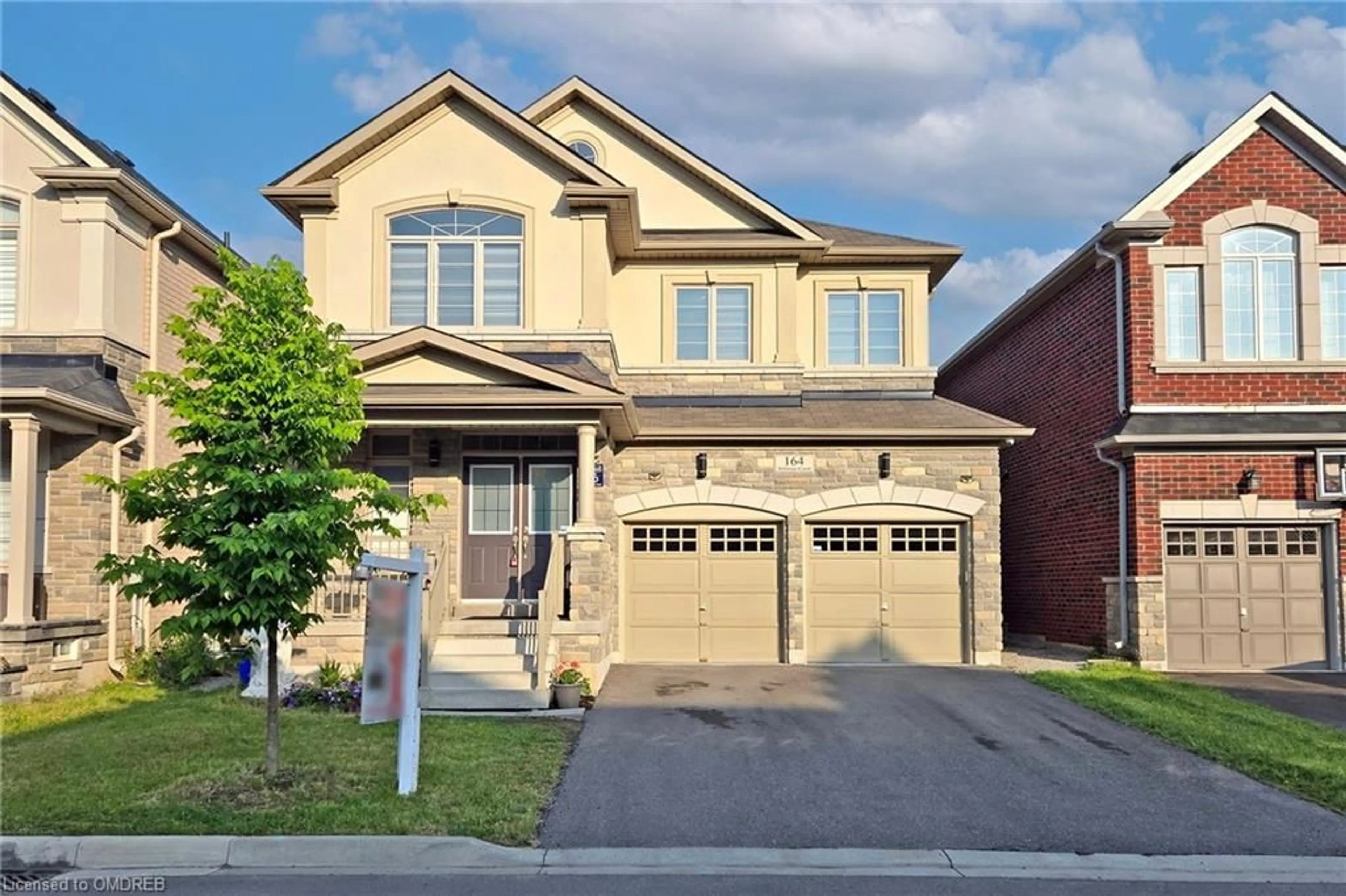 Home with brick exterior material for 164 Belmore Court Crt, Milton Ontario L9E 1H5