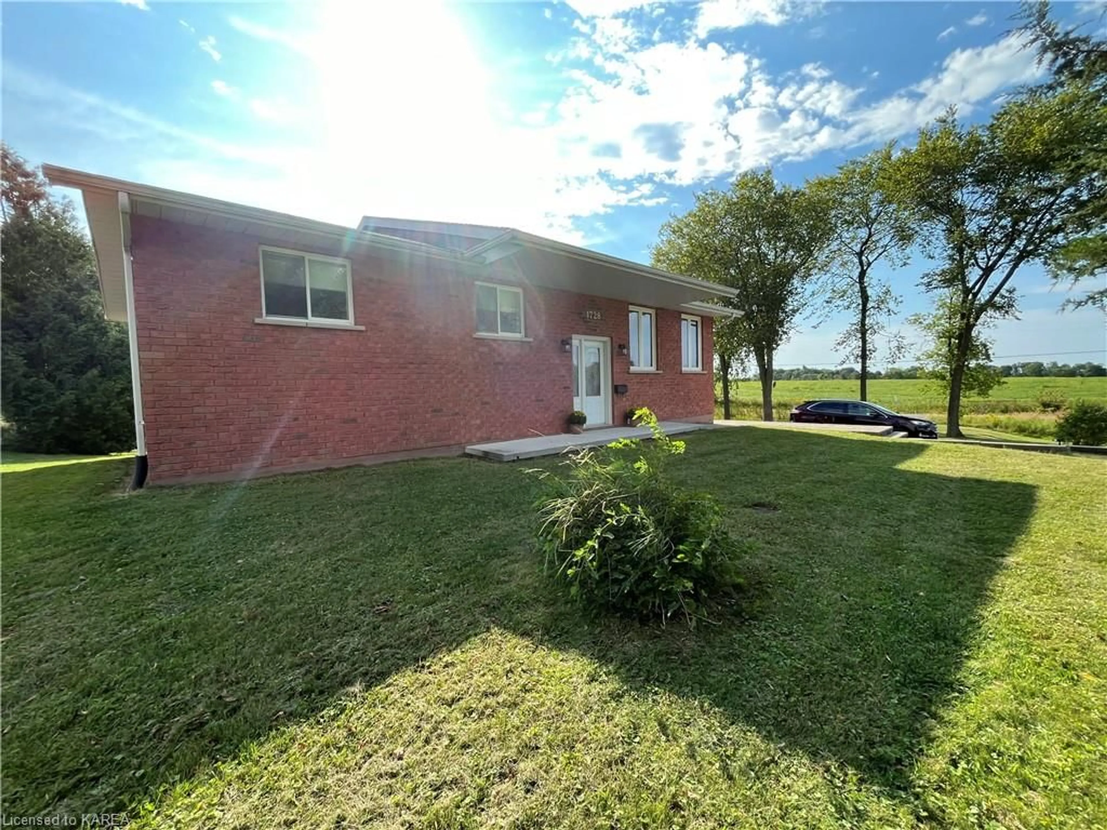 Frontside or backside of a home, the fenced backyard for 1728 Floyd Ave, Kingston Ontario K7L 4V4