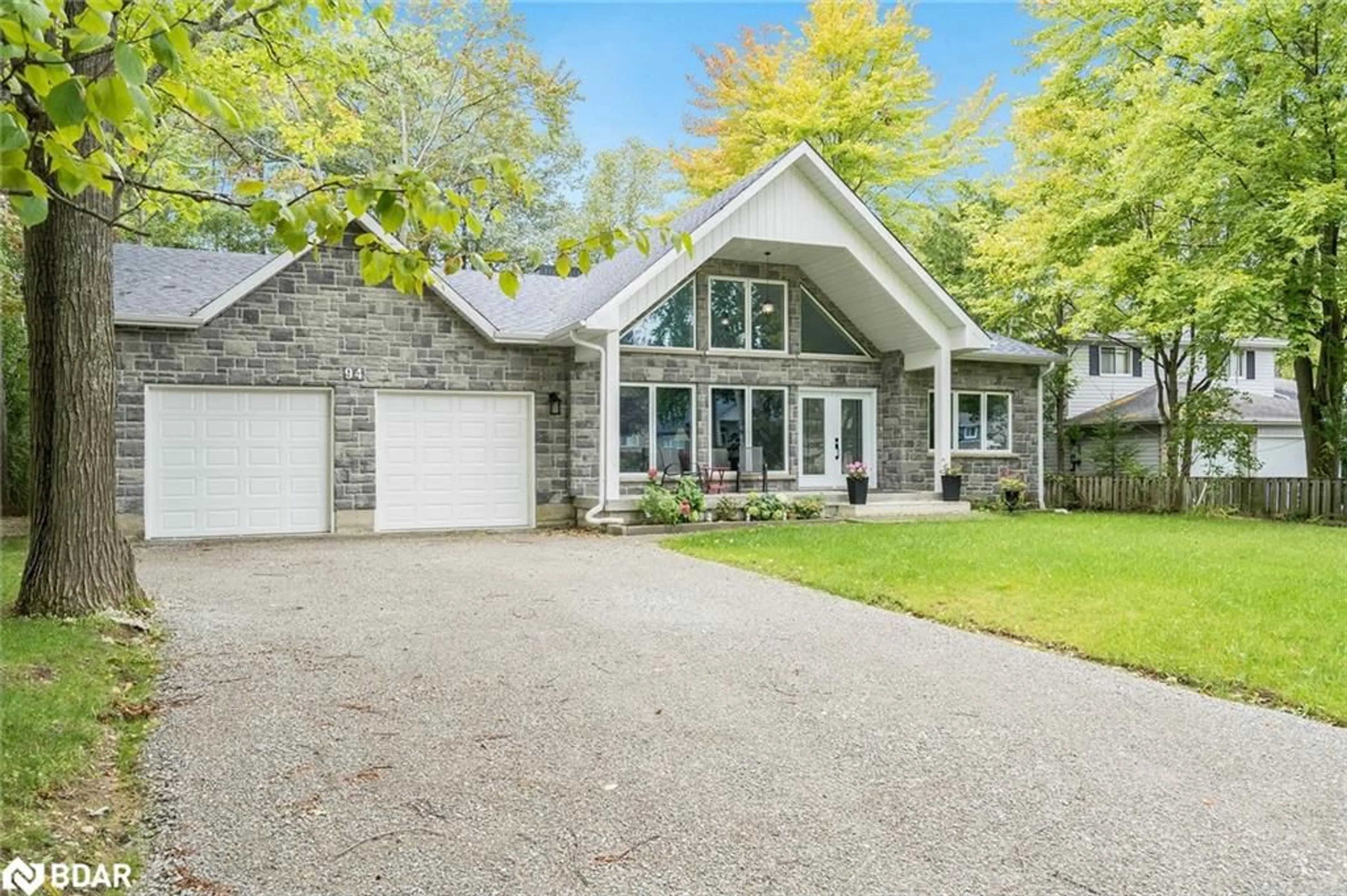 Frontside or backside of a home, cottage for 94 42nd St, Wasaga Beach Ontario L9Z 1Z7