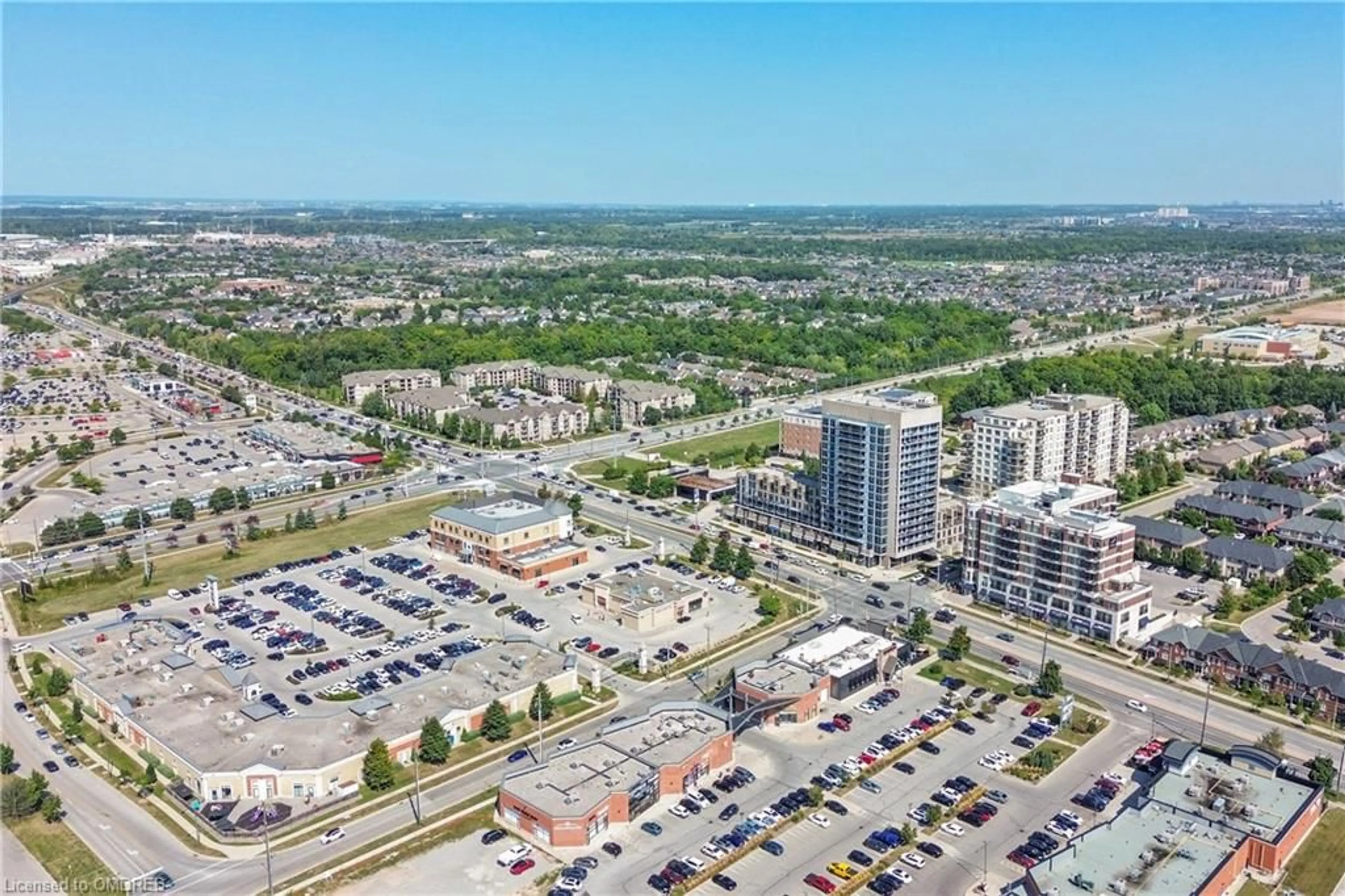 A pic from exterior of the house or condo, the view of city buildings for 1940 Ironstone Dr #709, Burlington Ontario L7L 0E4