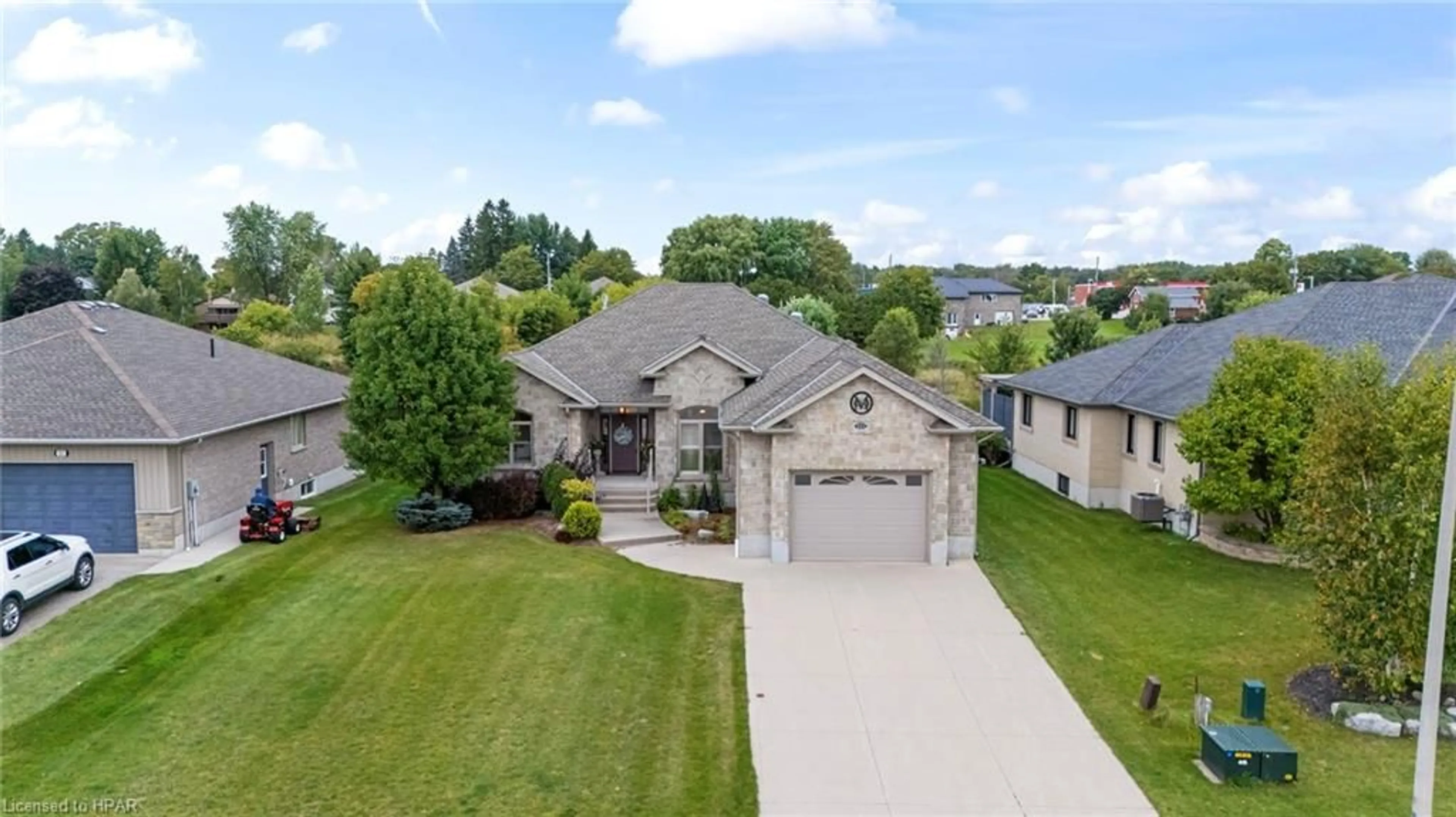 Frontside or backside of a home, the street view for 221 John St, Harriston Ontario N0G 1Z0