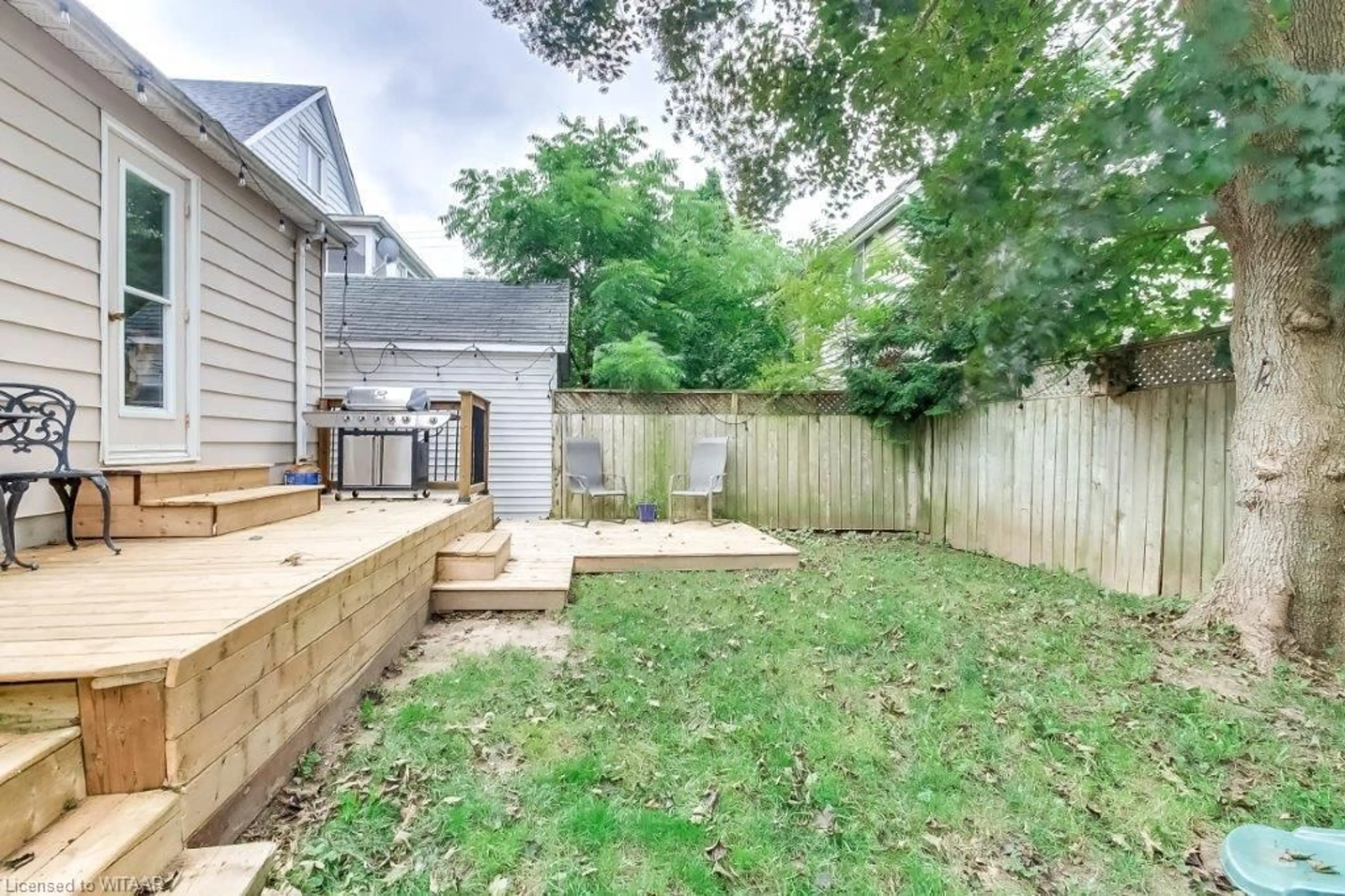 Patio, the fenced backyard for 243 Riddell St, Woodstock Ontario N4S 6N5