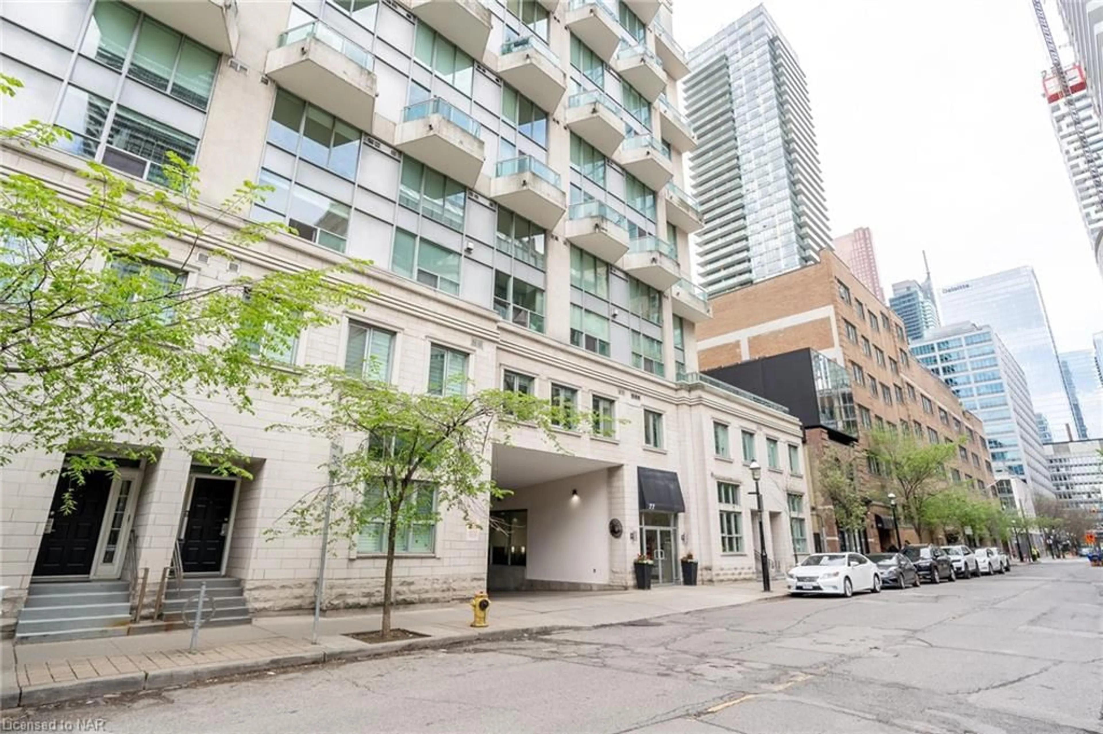 A pic from exterior of the house or condo, the front or back of building for 77 Lombard St #506, Toronto Ontario M5C 3E1