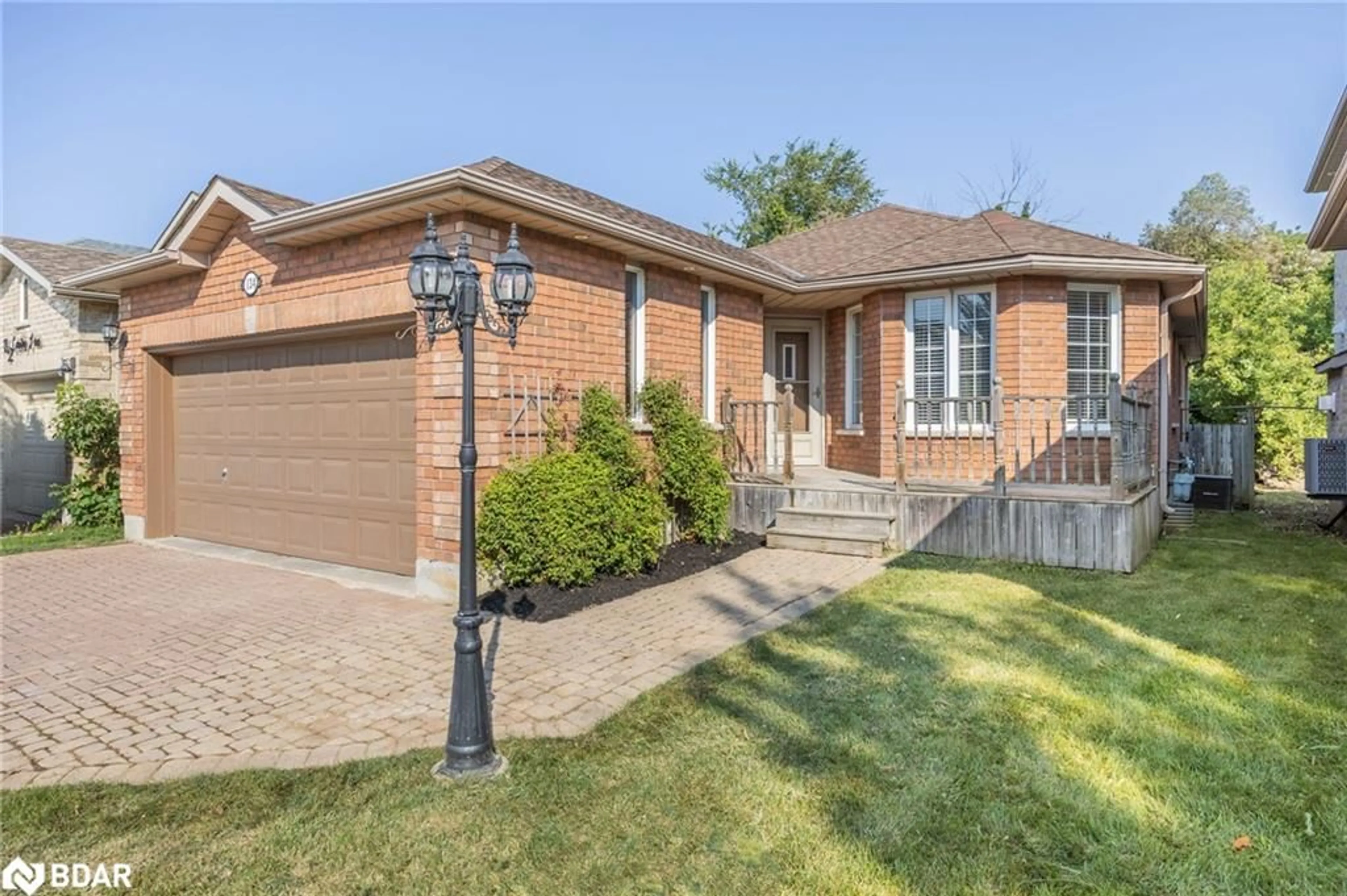 Home with brick exterior material for 134 Country Lane, Barrie Ontario L4N 0N2