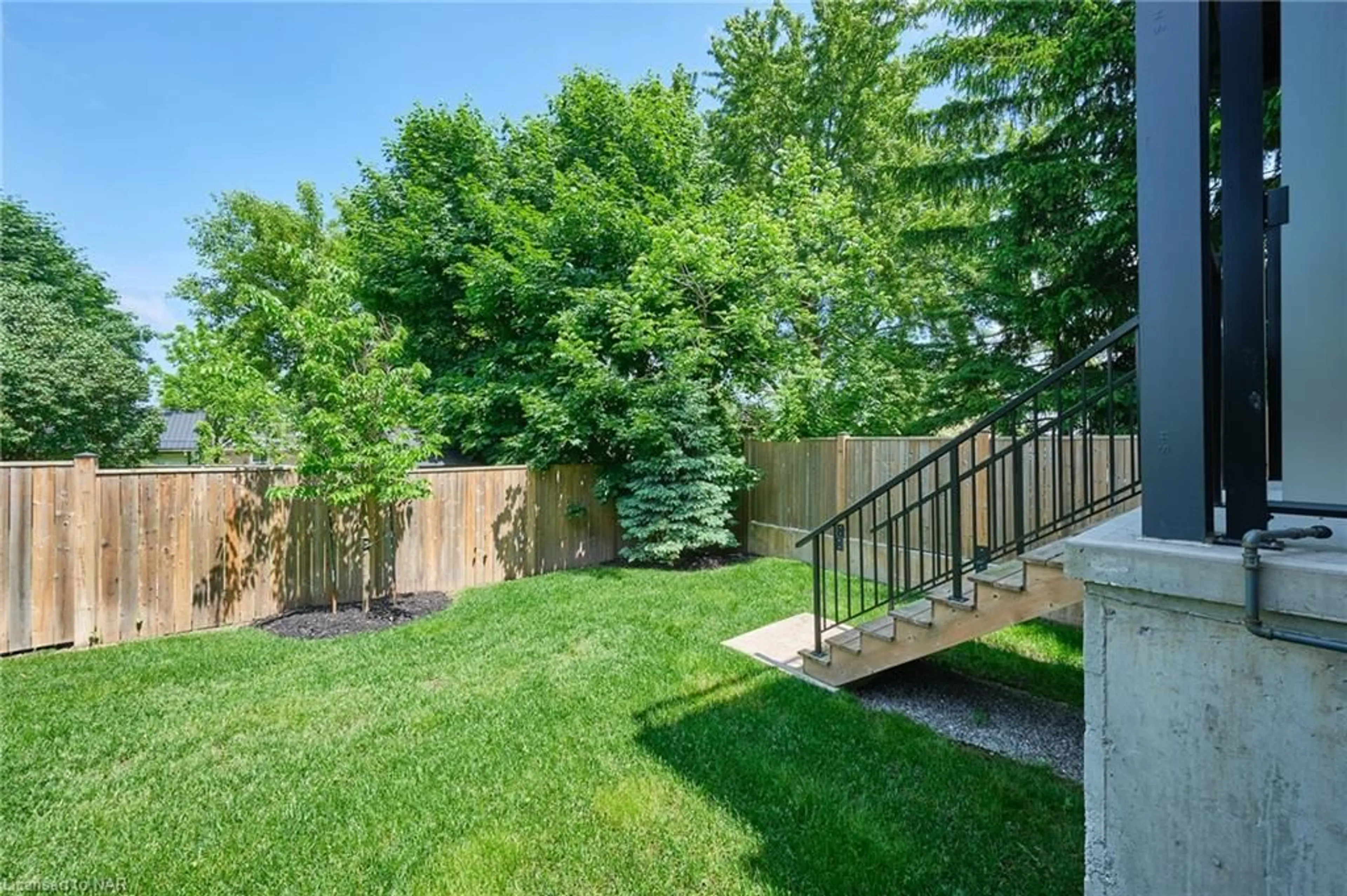 Patio, the fenced backyard for 1465 Station St #13, Fonthill Ontario L0S 1E0