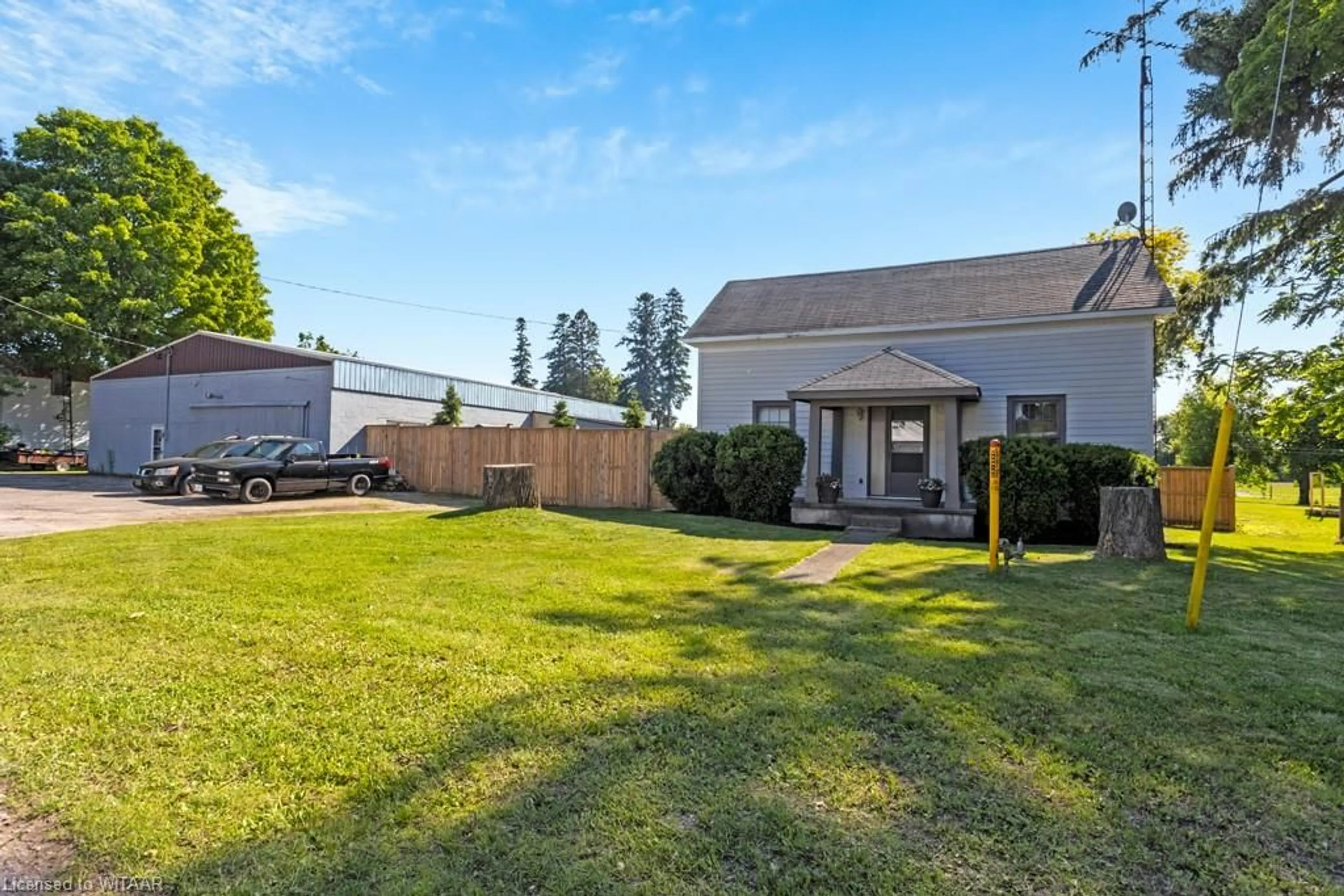 A pic from exterior of the house or condo, the fenced backyard for 2033 Main St, Walsingham Ontario N0E 1X0