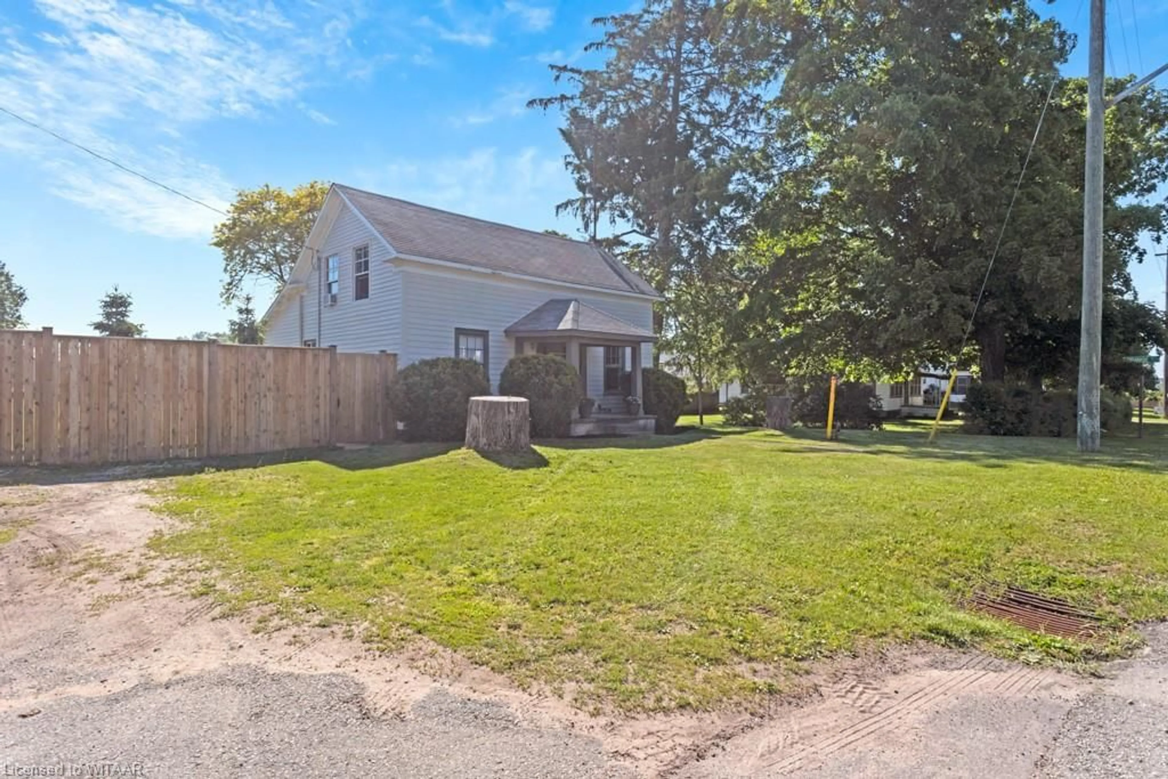 Frontside or backside of a home, the fenced backyard for 2033 Main St, Walsingham Ontario N0E 1X0