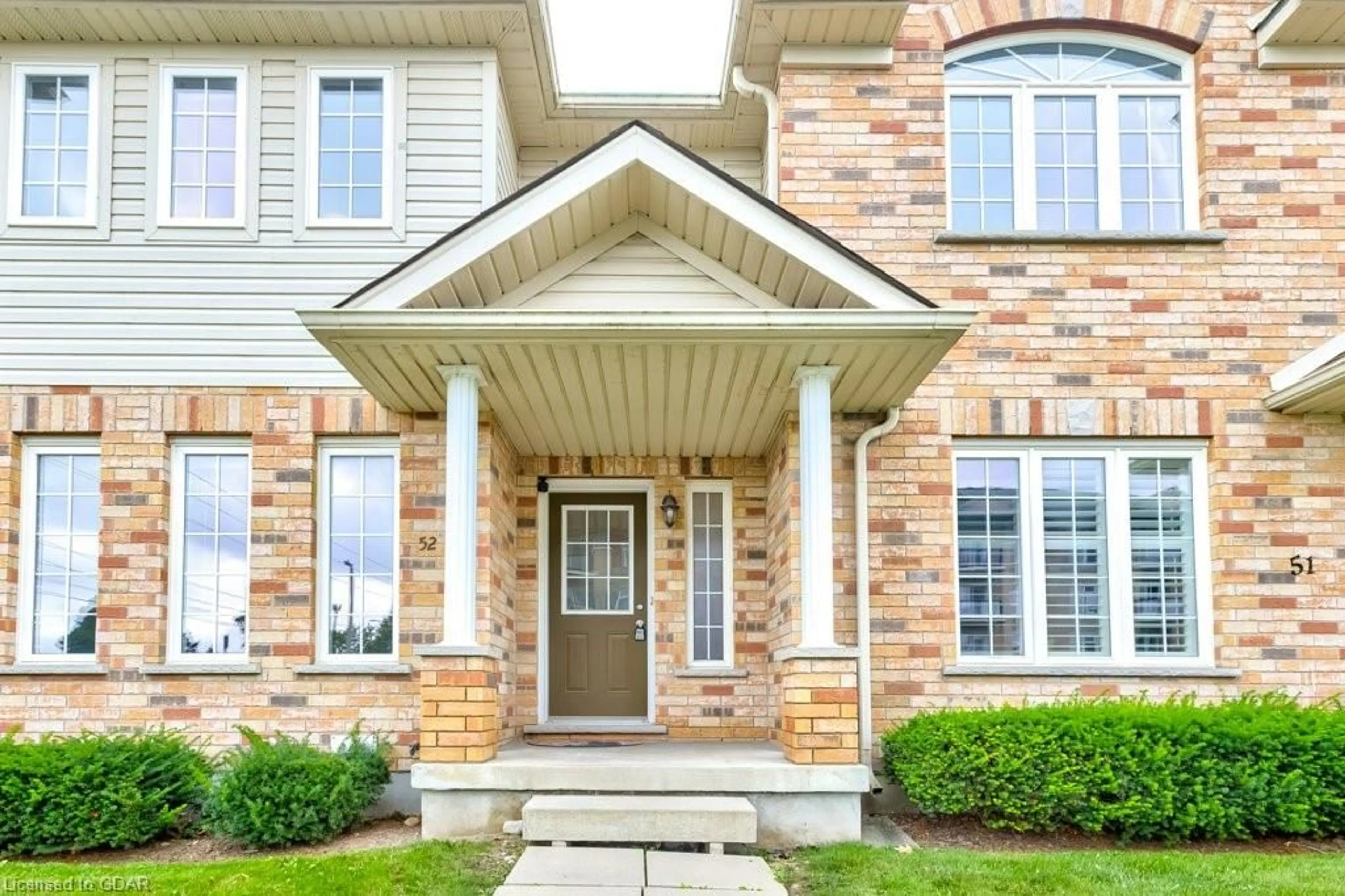 Home with brick exterior material for 105 Bard Blvd #52, Guelph Ontario N1L 0E2