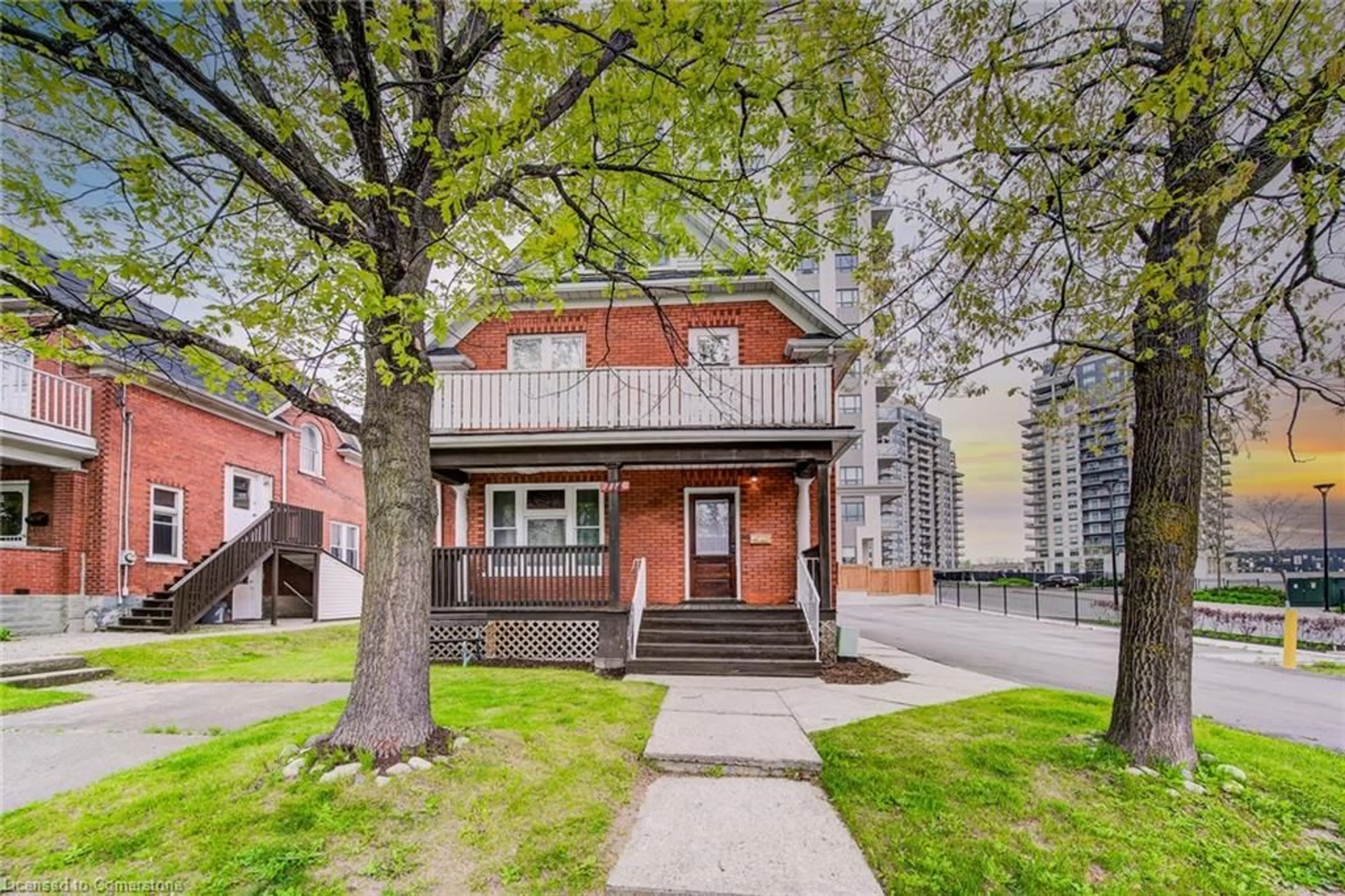 A pic from exterior of the house or condo, the street view for 114 Erb St, Waterloo Ontario N2L 1T5