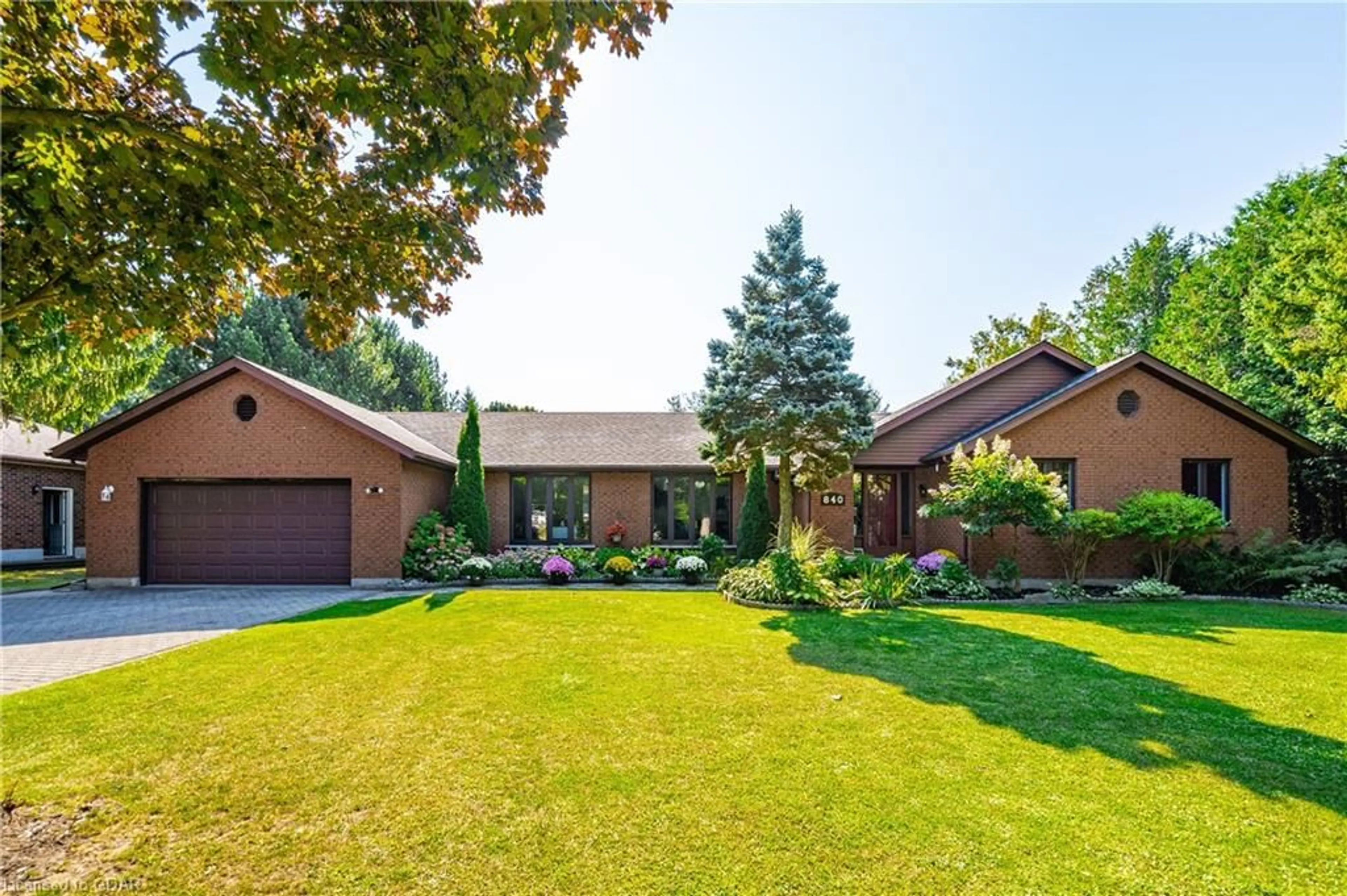 Frontside or backside of a home, the fenced backyard for 840 St George St, Fergus Ontario N1M 2Y1