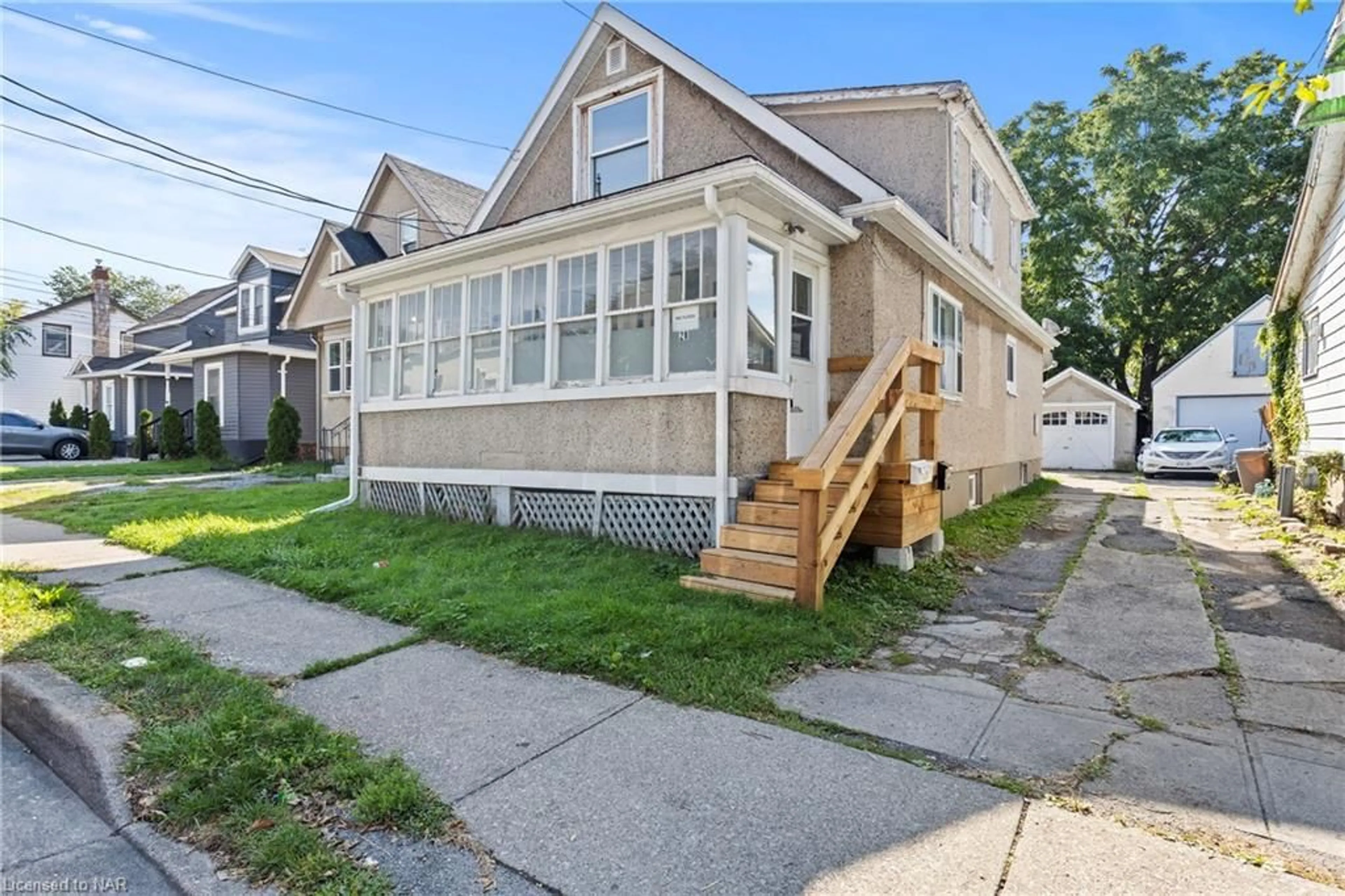 Frontside or backside of a home, cottage for 28 Division St, St. Catharines Ontario L2R 3G2