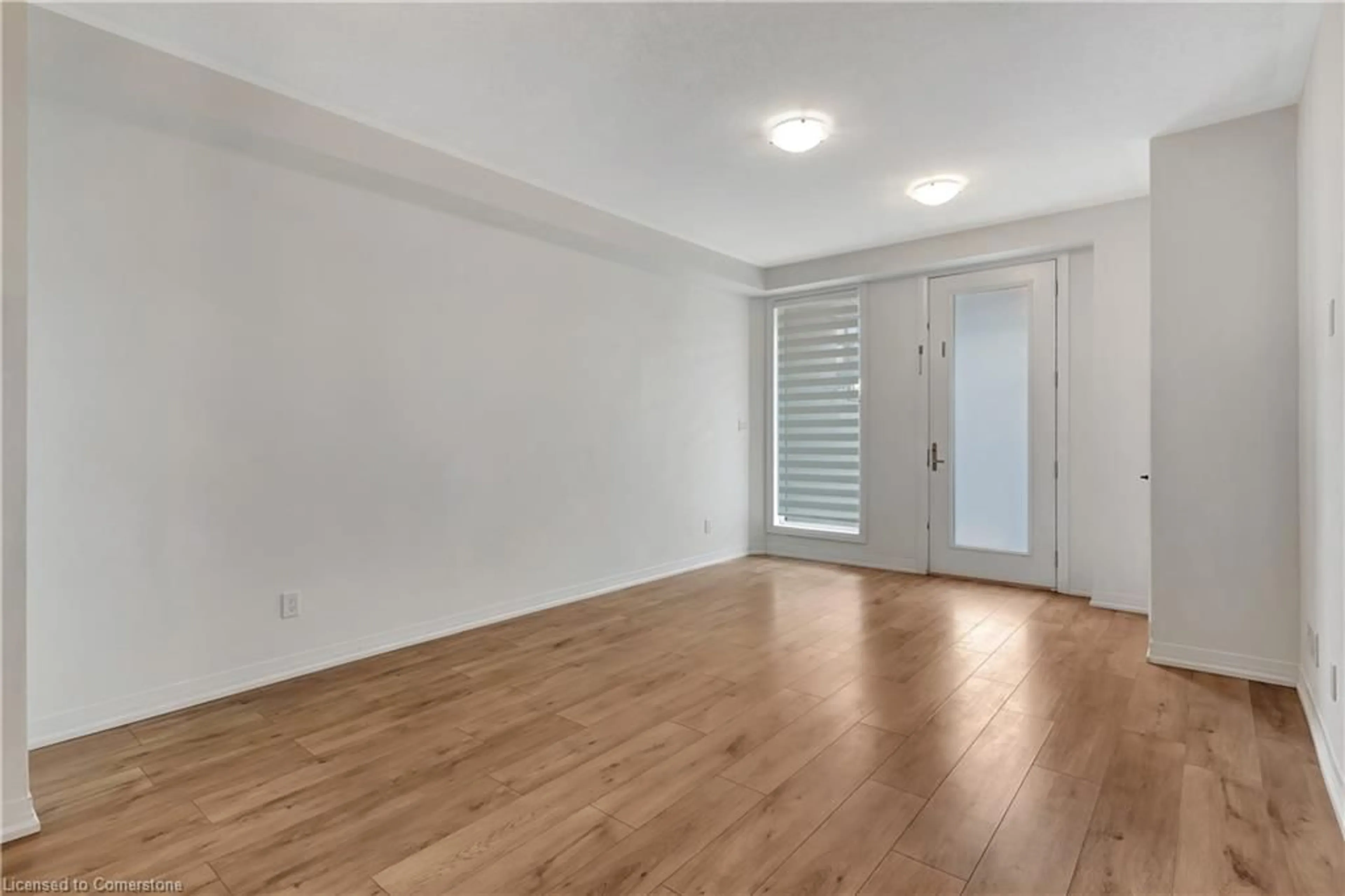 A pic of a room, wood floors for 261 Woodbine Ave #59, Kitchener Ontario N2R 0A9