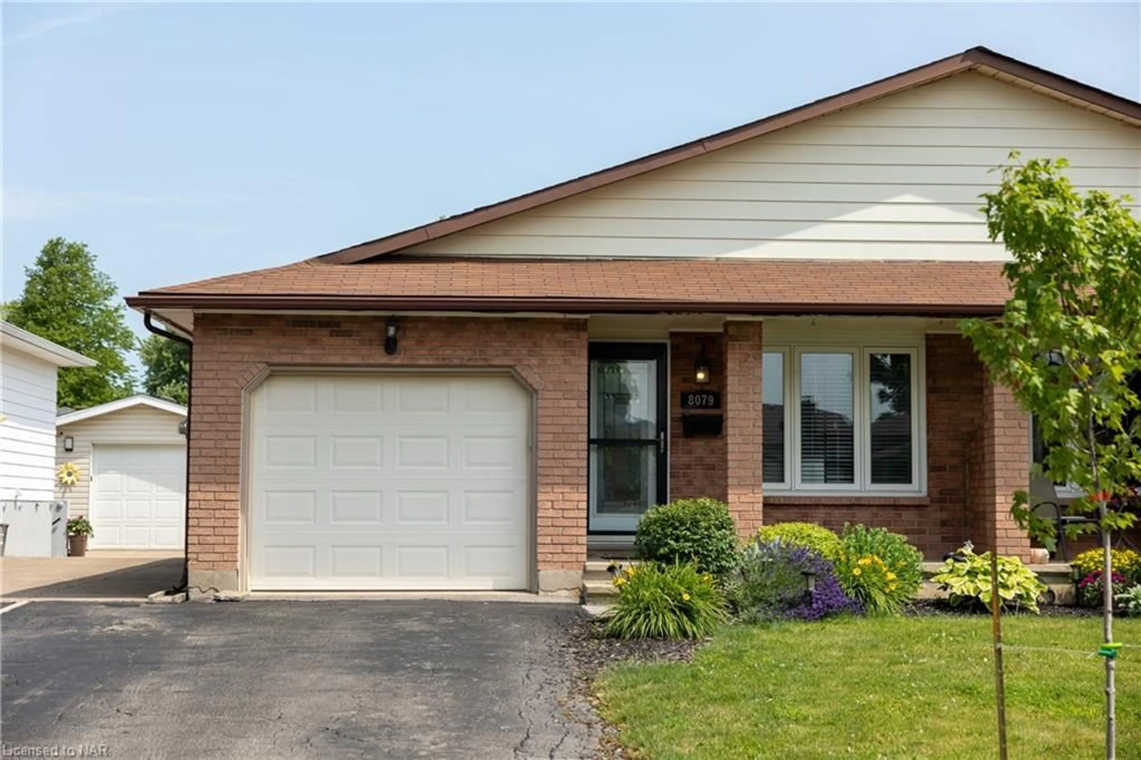 Home with brick exterior material for 8079 Post Rd, Niagara Falls Ontario L2H 2L2