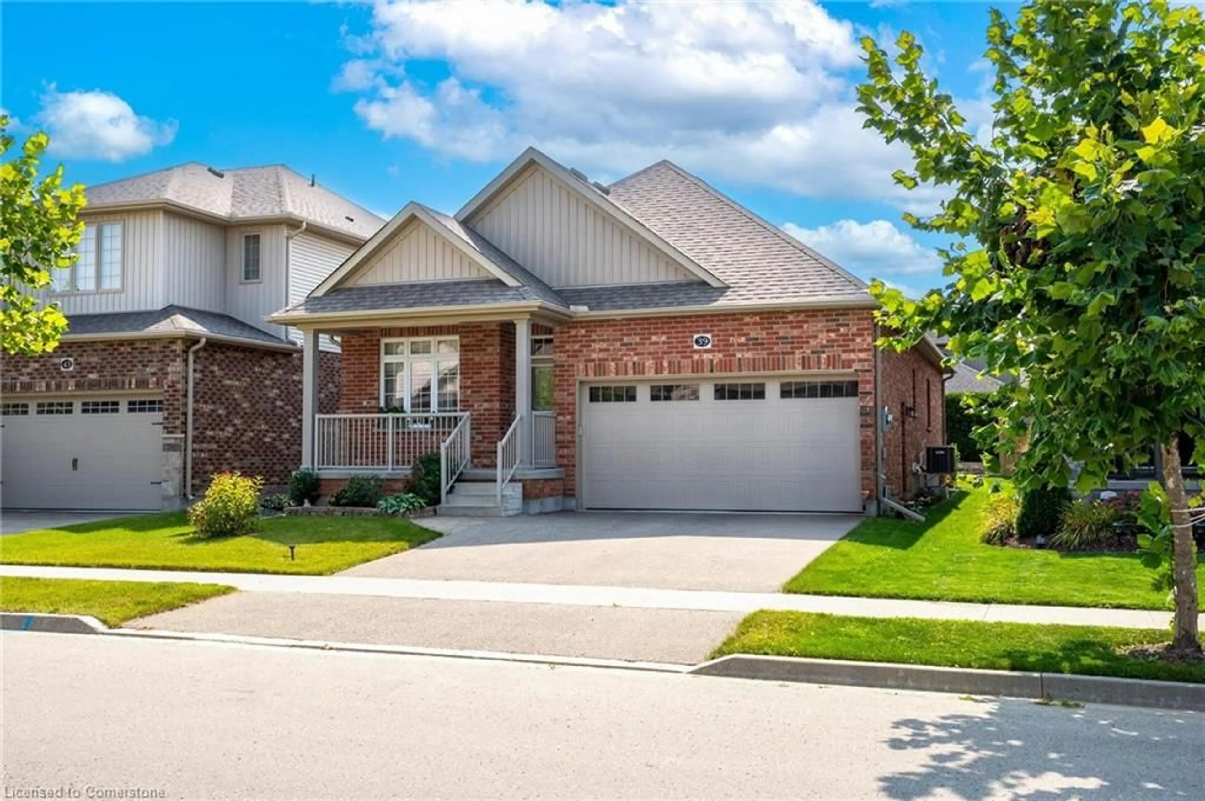 Home with brick exterior material for 39 Woodberry Cres, Elmira Ontario N3B 0C5