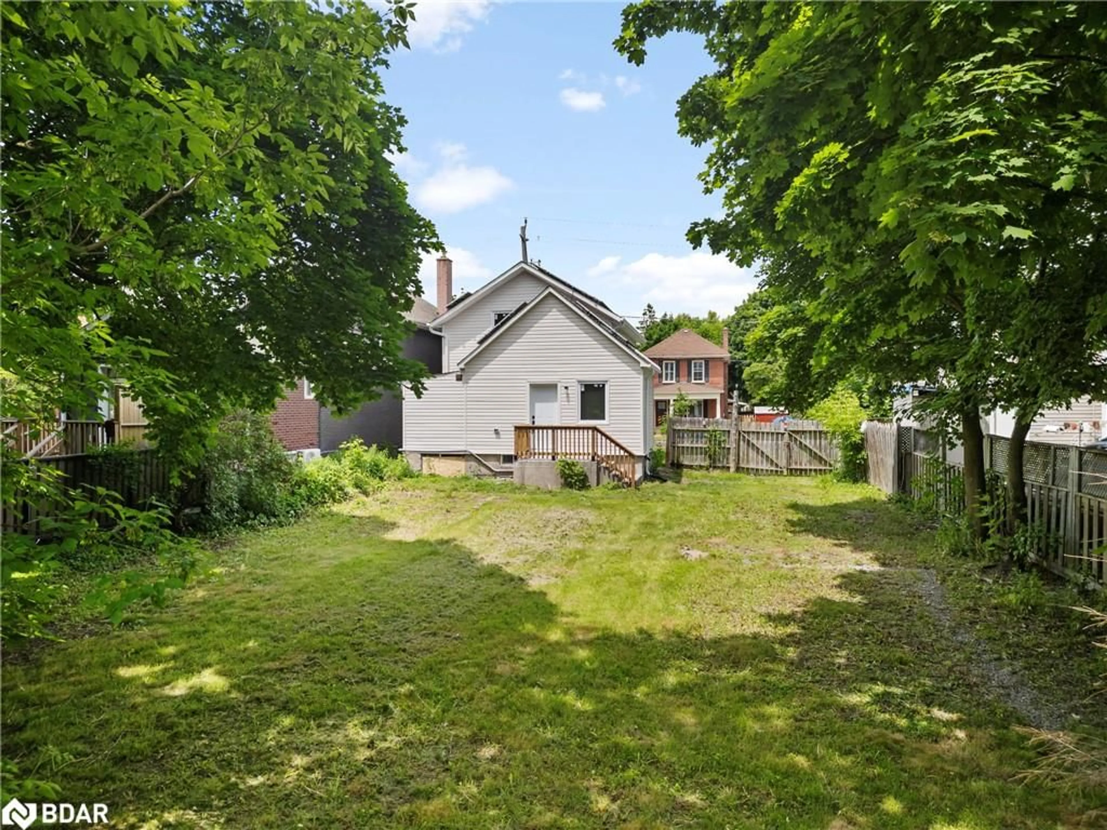 Frontside or backside of a home, the fenced backyard for 489 Sherbrooke St, Peterborough Ontario K9J 2P2