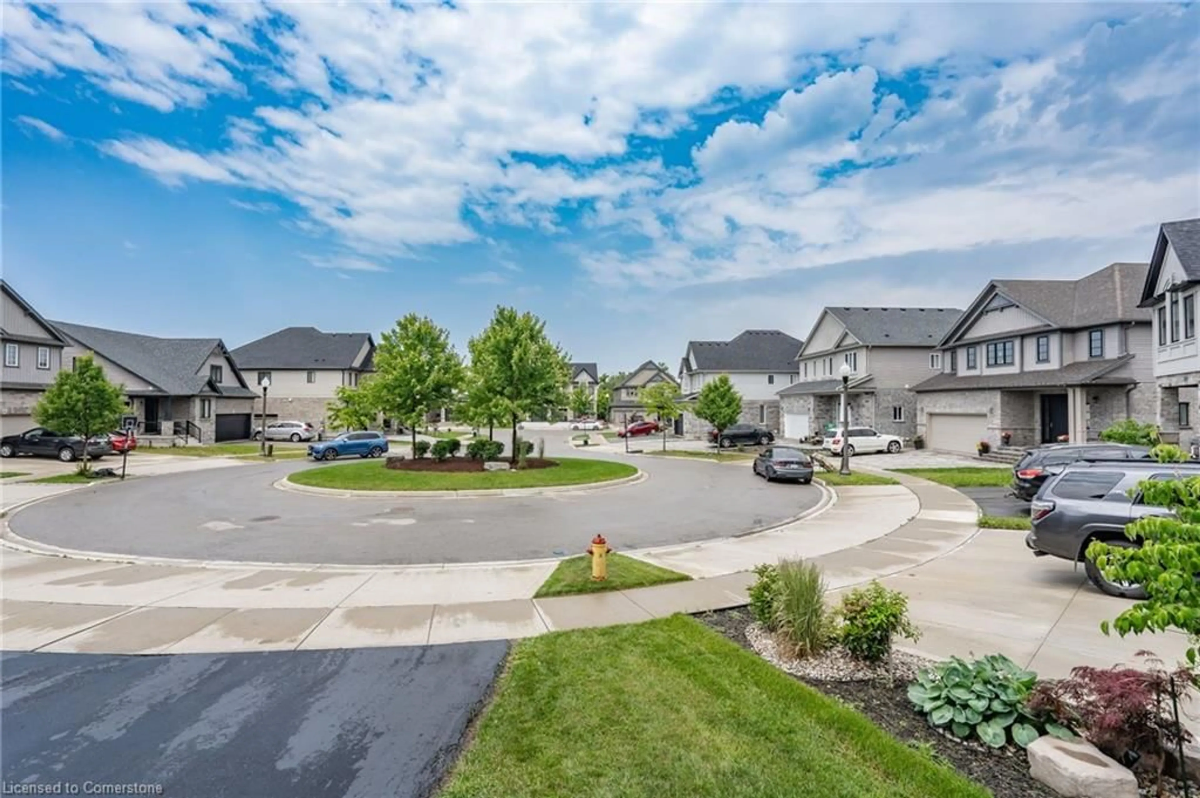 Frontside or backside of a home, the street view for 920 River Ridge Crt, Kitchener Ontario N2A 0H2