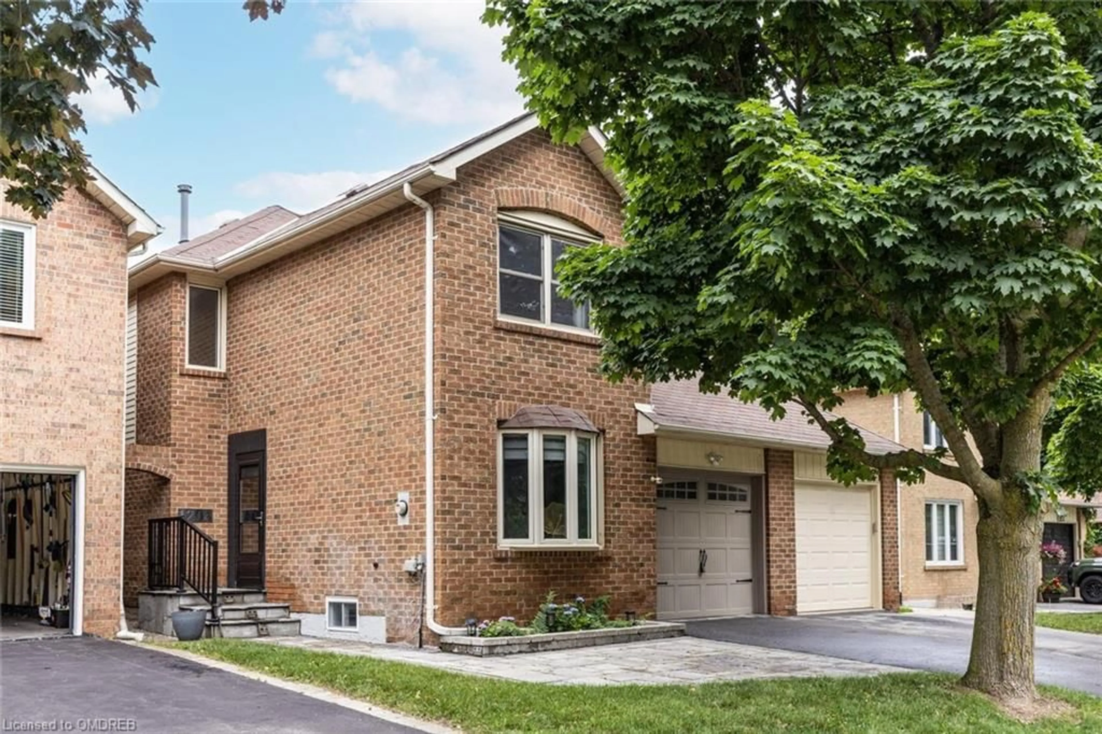 Home with brick exterior material for 1204 Potters Wheel Cres, Oakville Ontario L6M 1J2