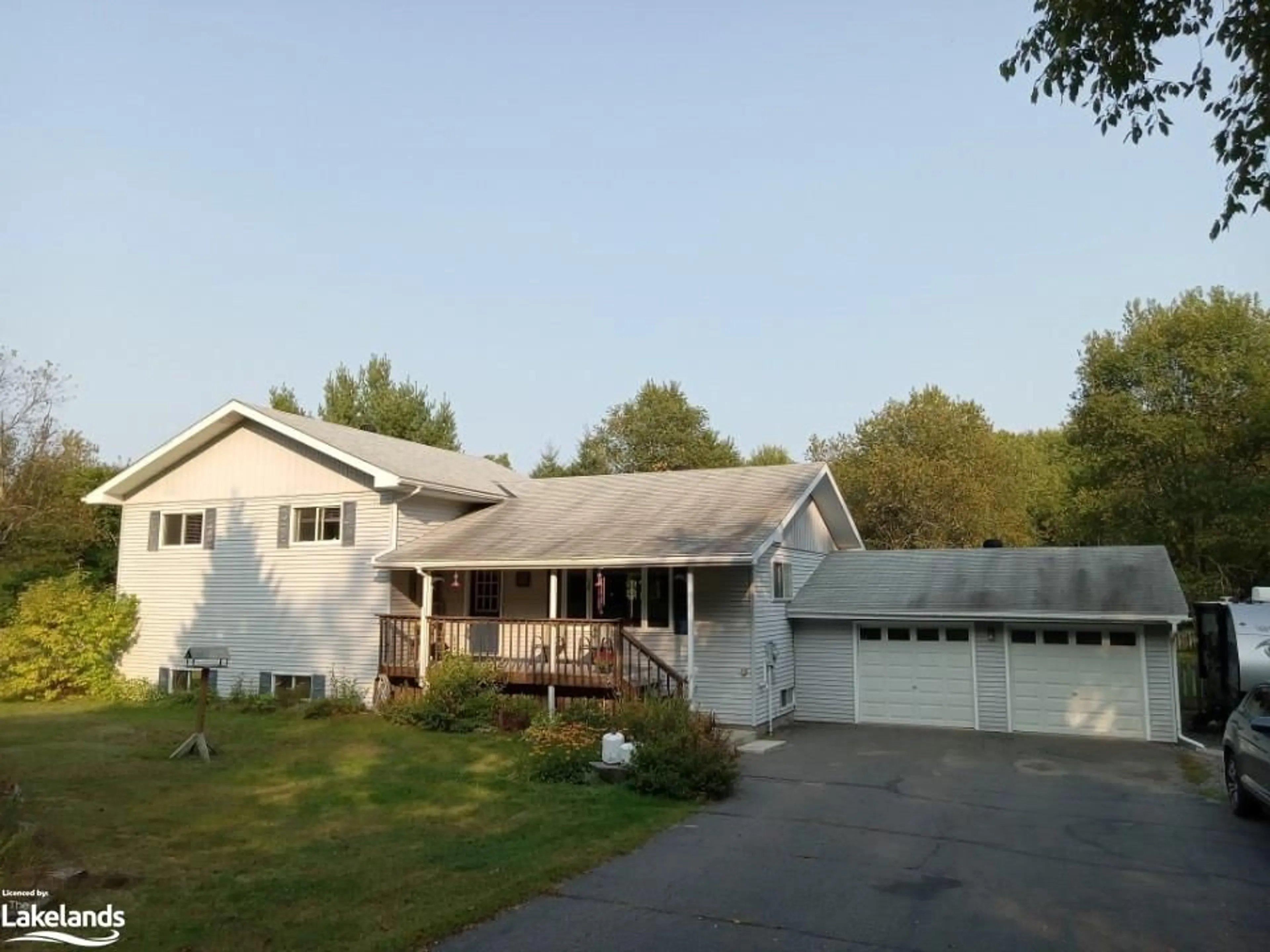 Frontside or backside of a home, the street view for 705 Old North Rd, Huntsville Ontario P1H 2J4