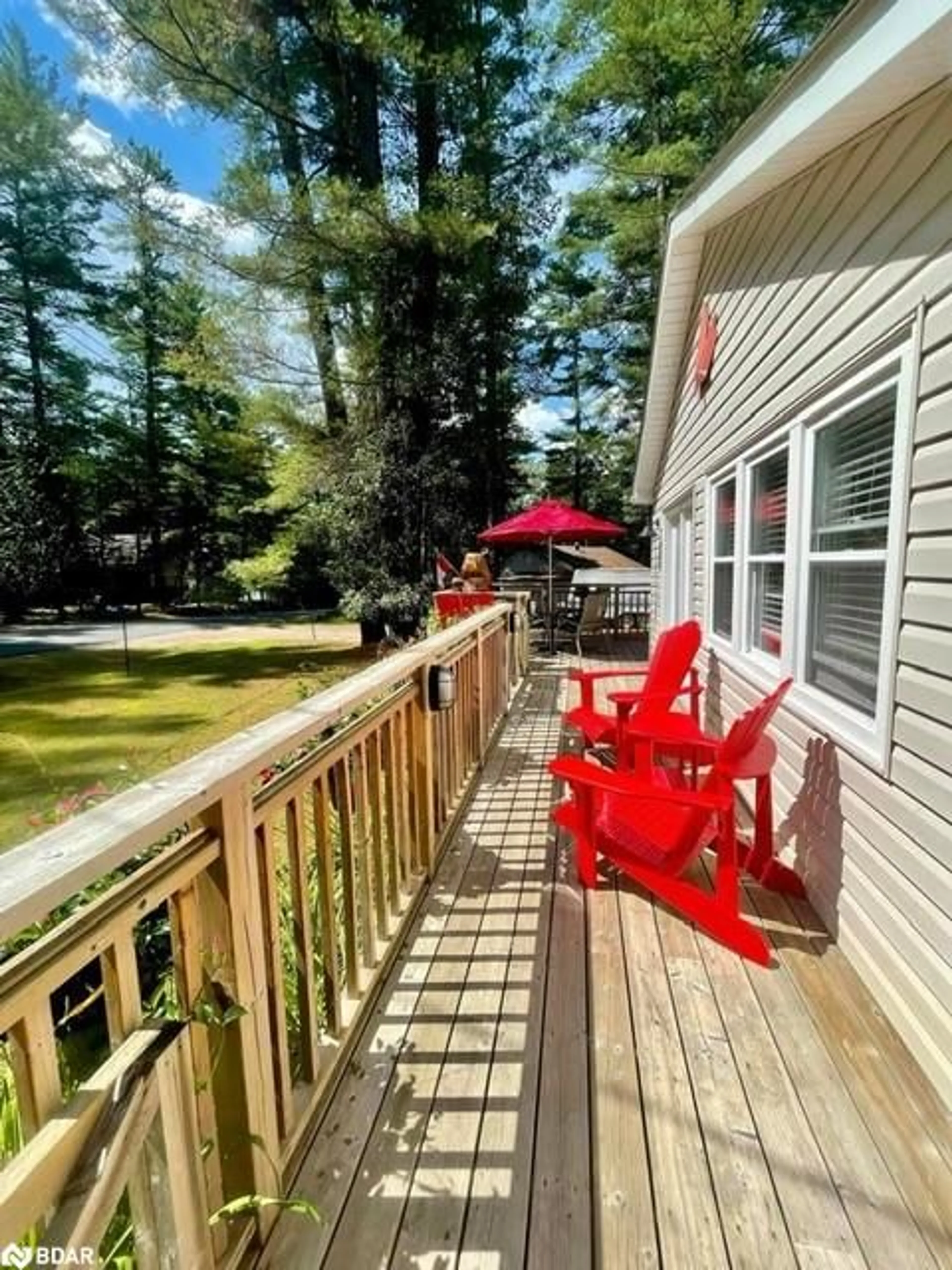 Patio, the fenced backyard for 886 Muskoka Road 10 Rd, Port Sydney Ontario P0B 1L0