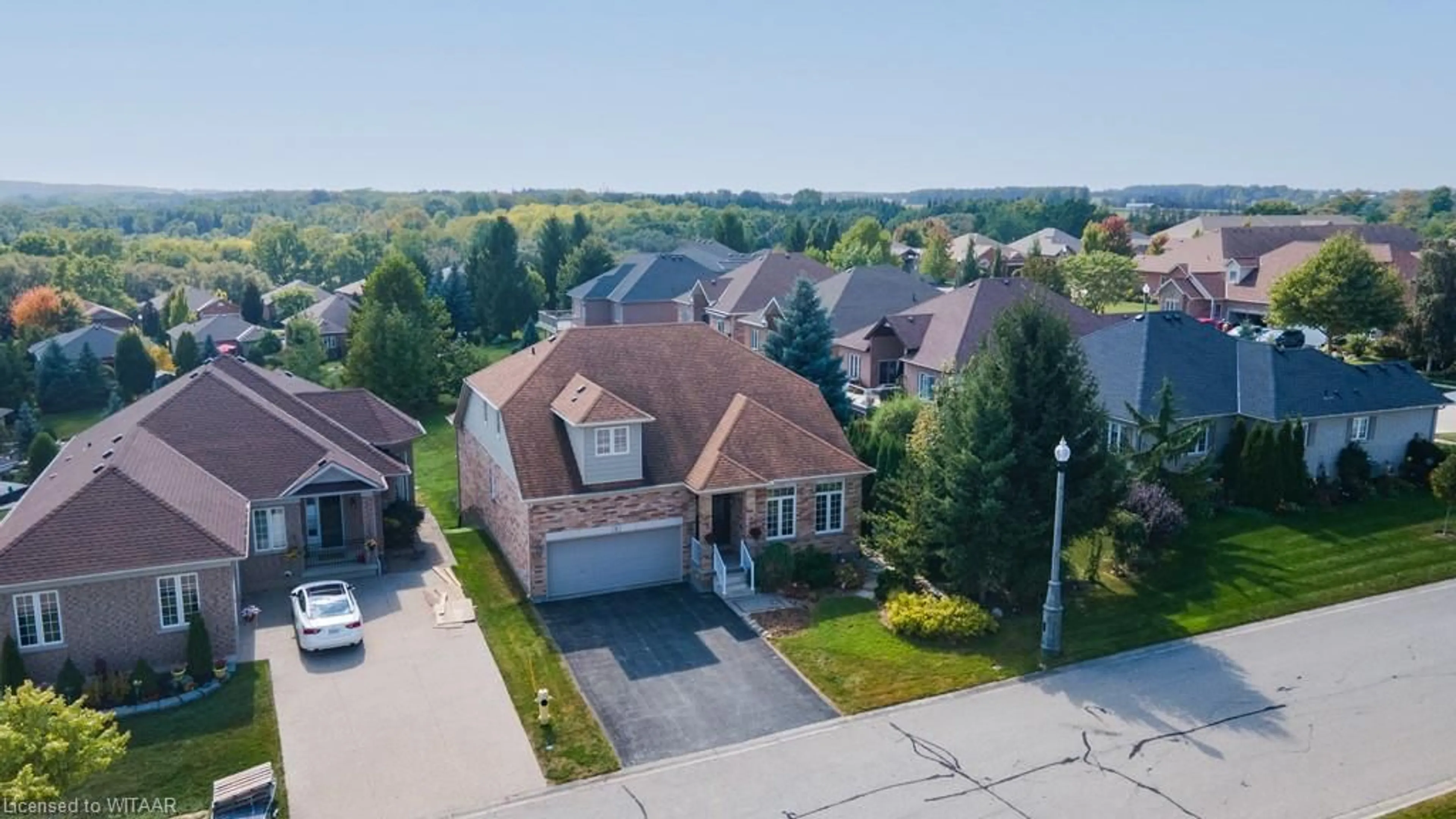 Frontside or backside of a home, the street view for 2 Green Gable Place, Woodstock Ontario N4T 1W6