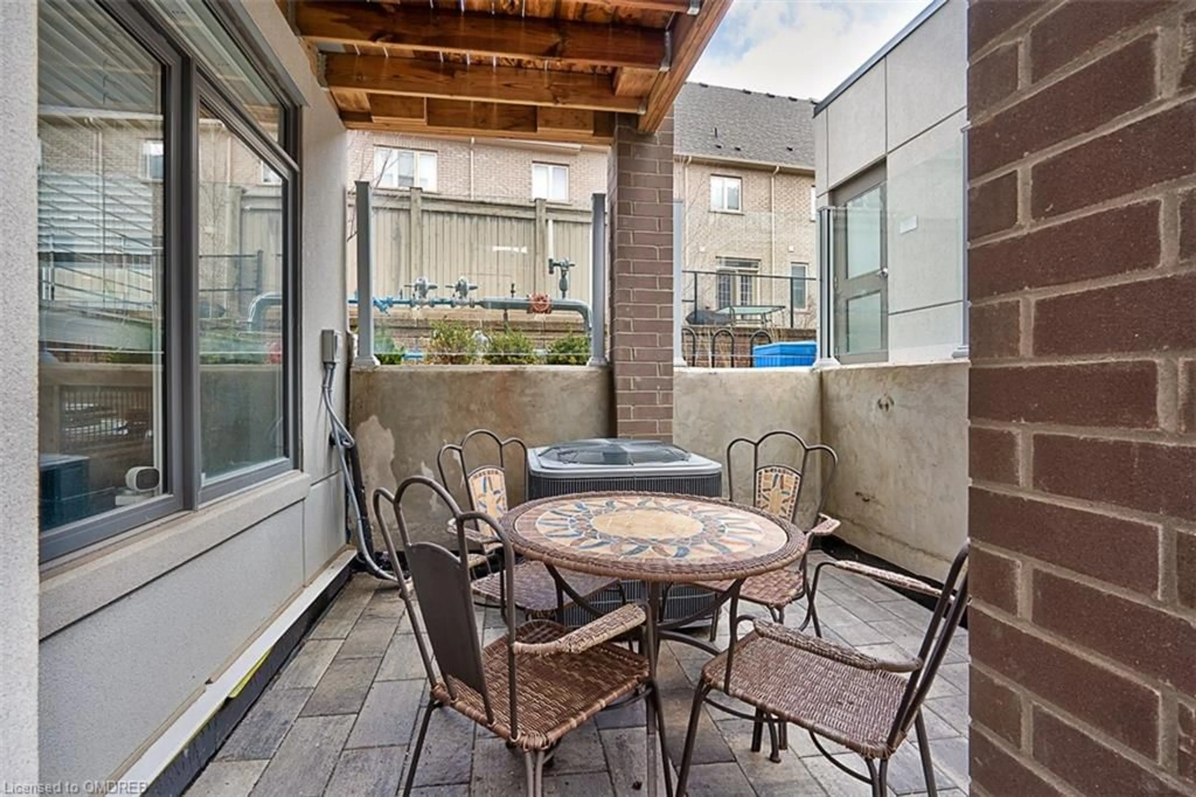 Patio, the fenced backyard for 3058 Sixth Line #101, Oakville Ontario L6M 1P8