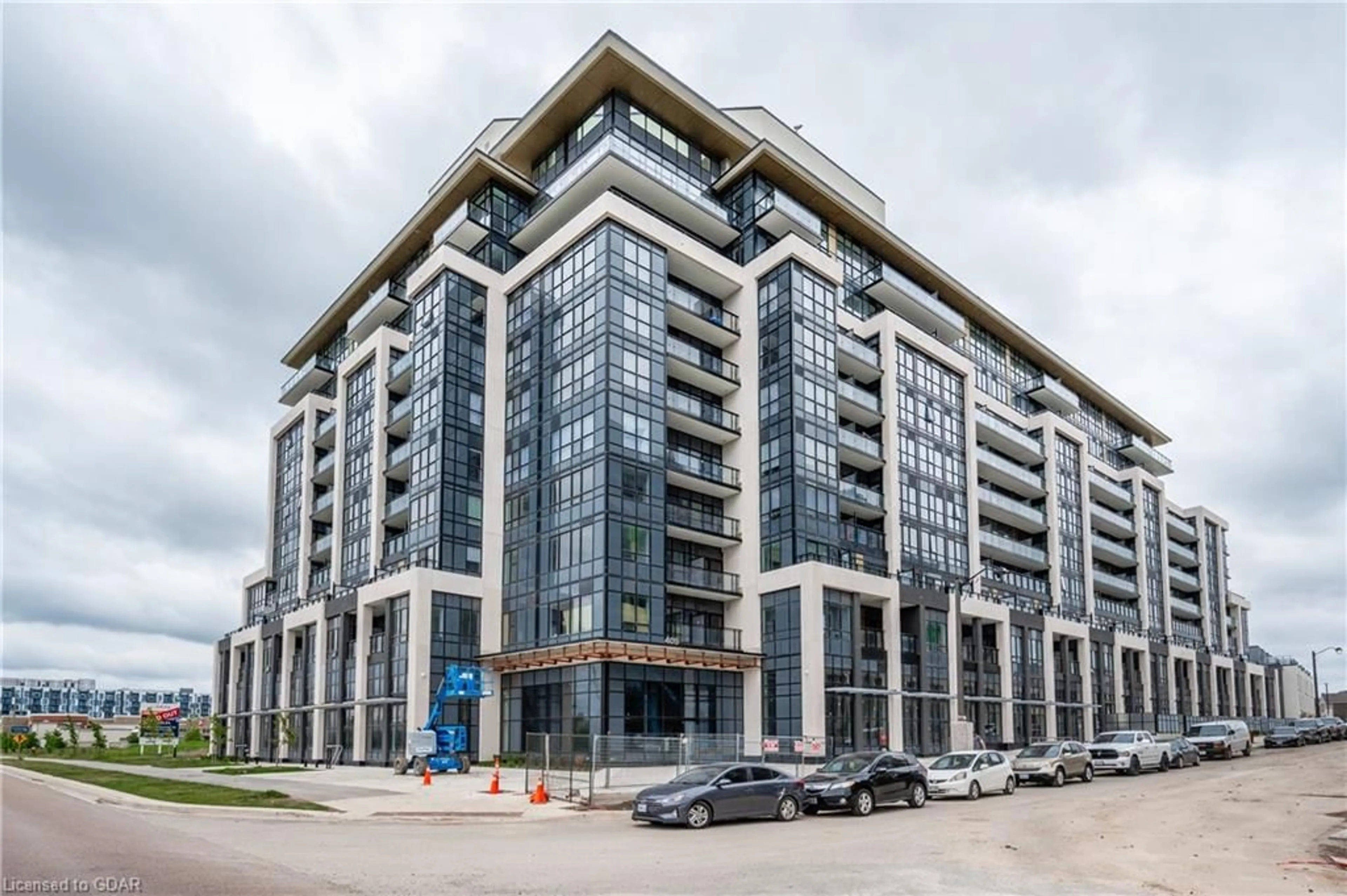 A pic from exterior of the house or condo, the front or back of building for 405 Dundas St #103, Oakville Ontario L6M 5P9