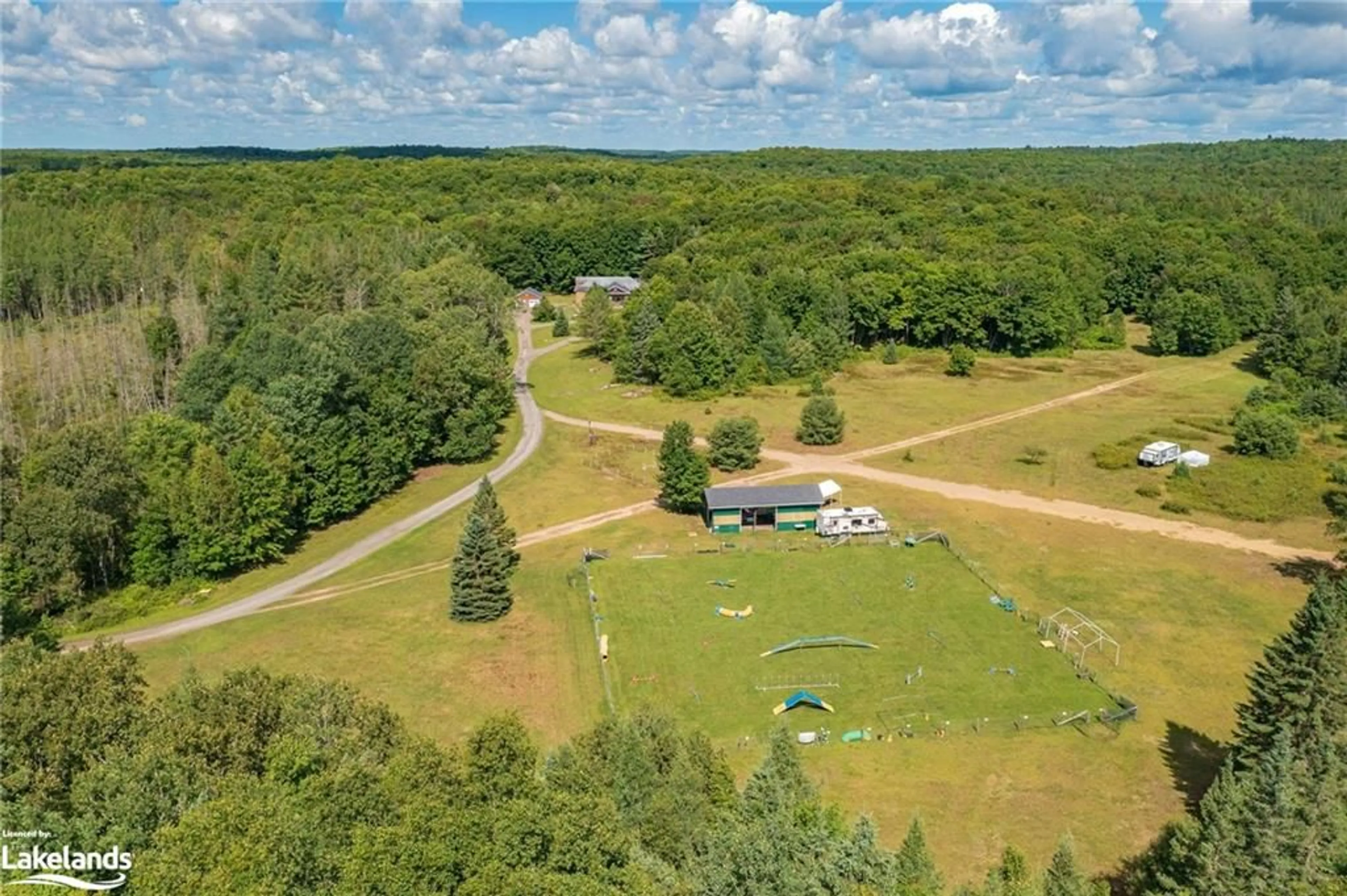 Patio, the fenced backyard for 155 Old Centurian Rd, Huntsville Ontario P1H 2N5