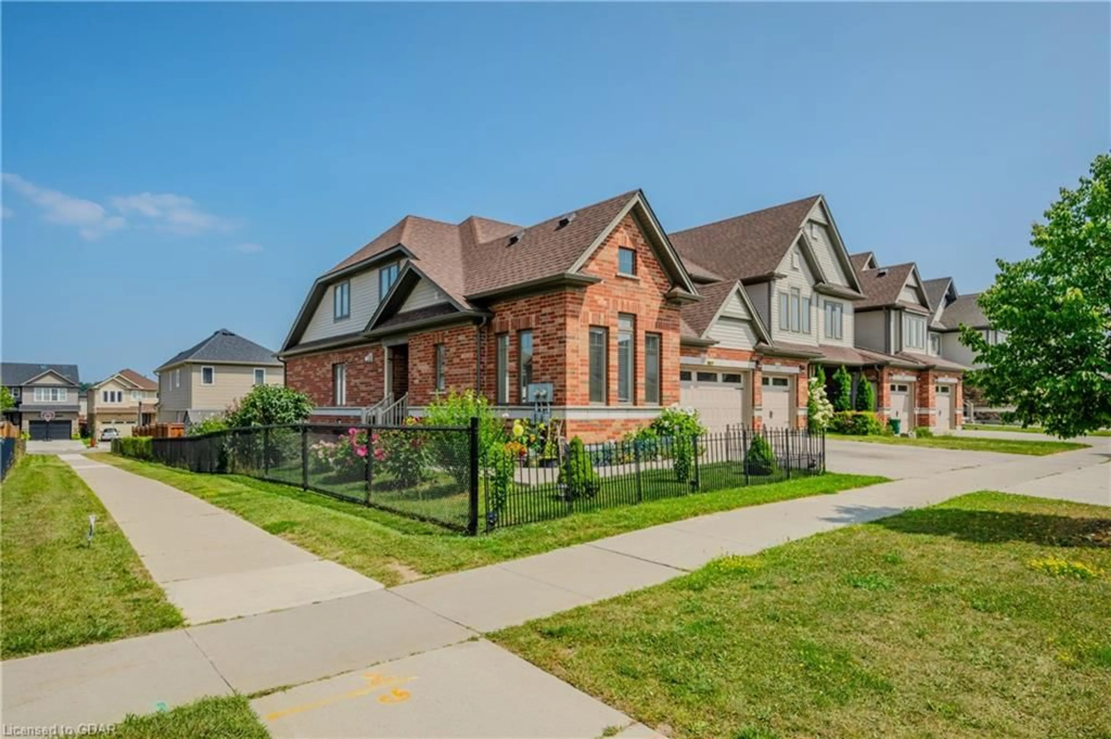 Frontside or backside of a home, the street view for 205 Eden Oak Trail, Kitchener Ontario N2A 0H6