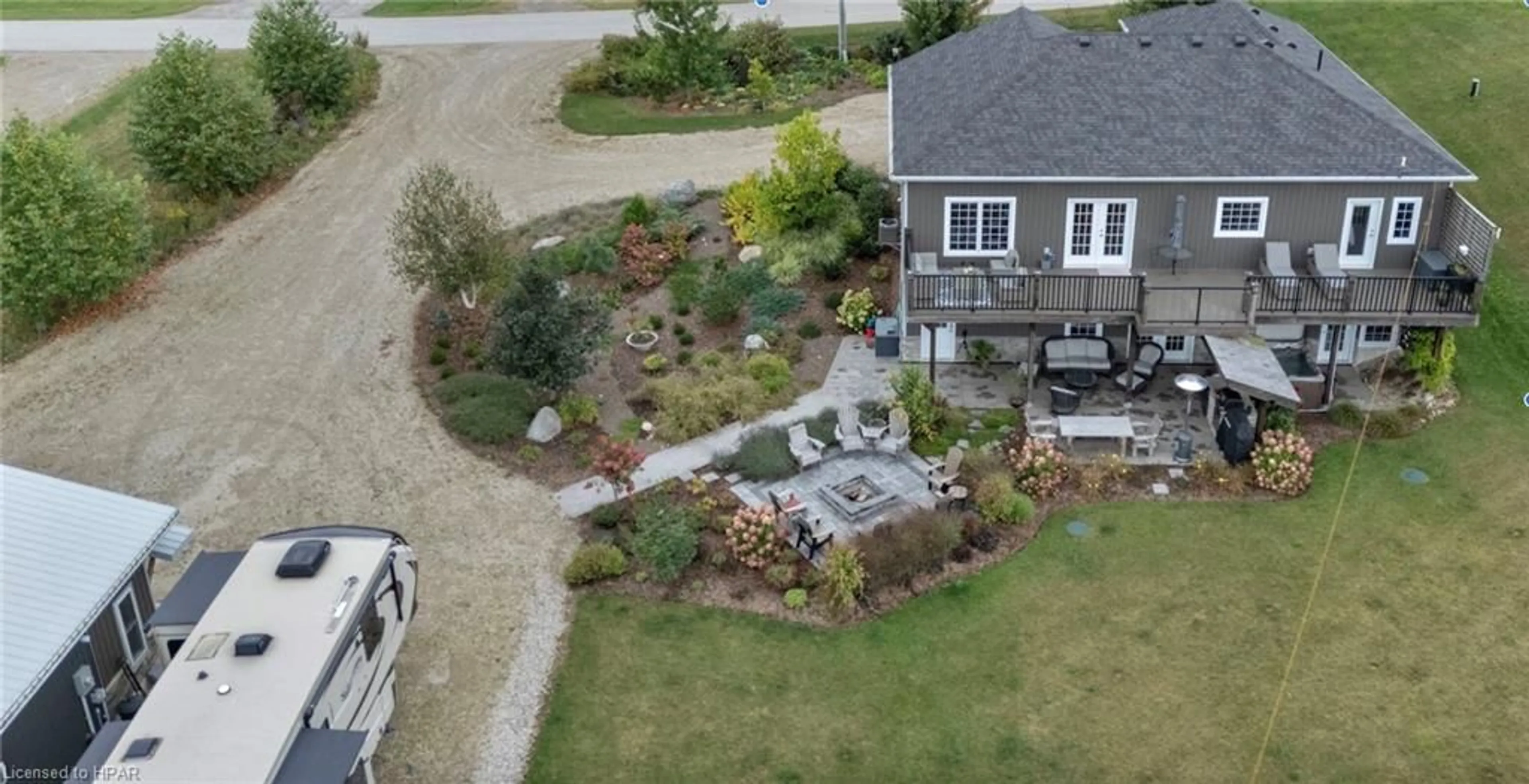 Frontside or backside of a home, the fenced backyard for 1106 Church St, Wroxeter Ontario N0G 2X0