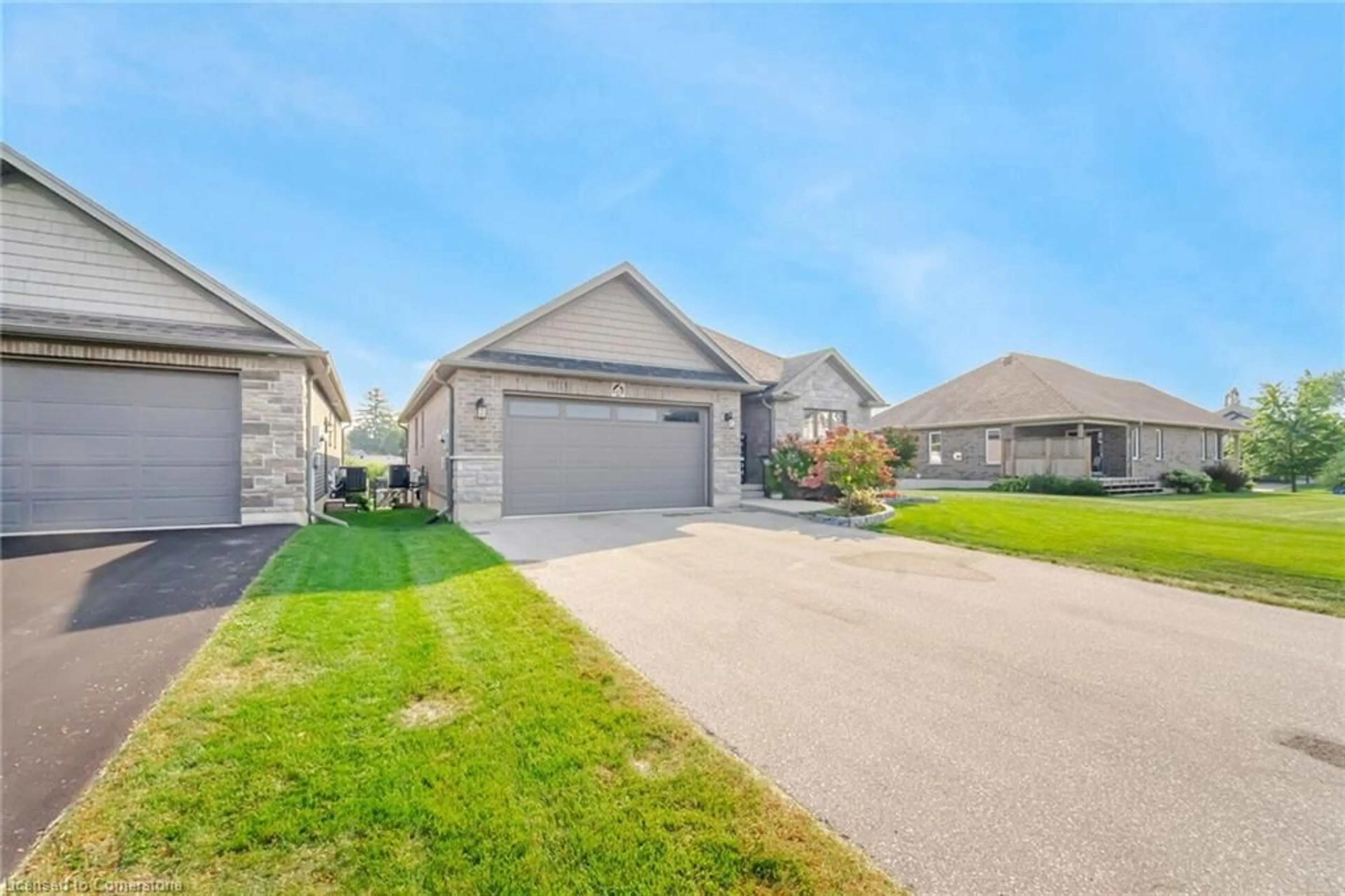 Frontside or backside of a home, the street view for 49 Halliday Dr, Tavistock Ontario N0B 2R0