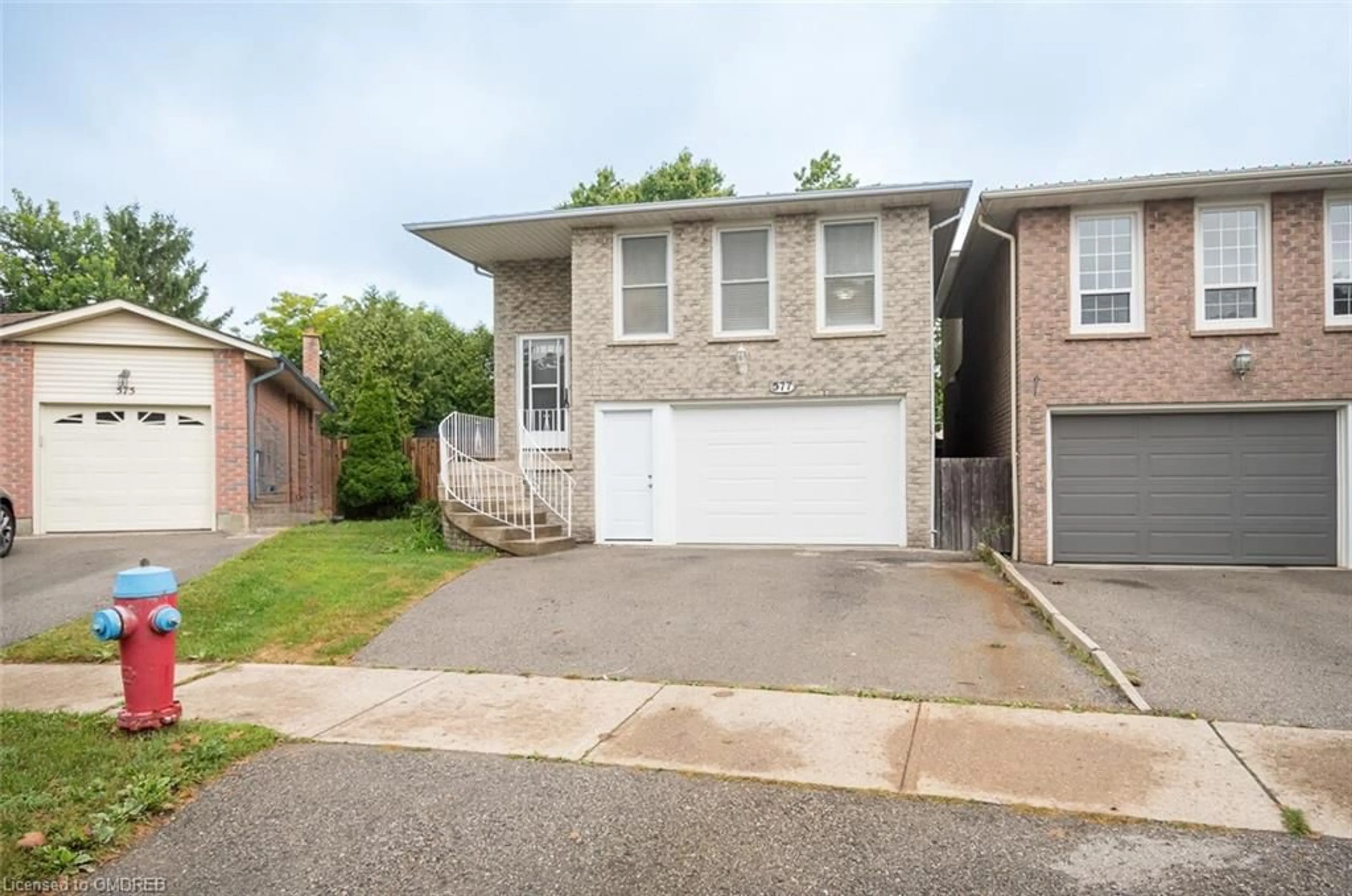 Frontside or backside of a home for 577 Hayward Cres, Milton Ontario L9T 4T8