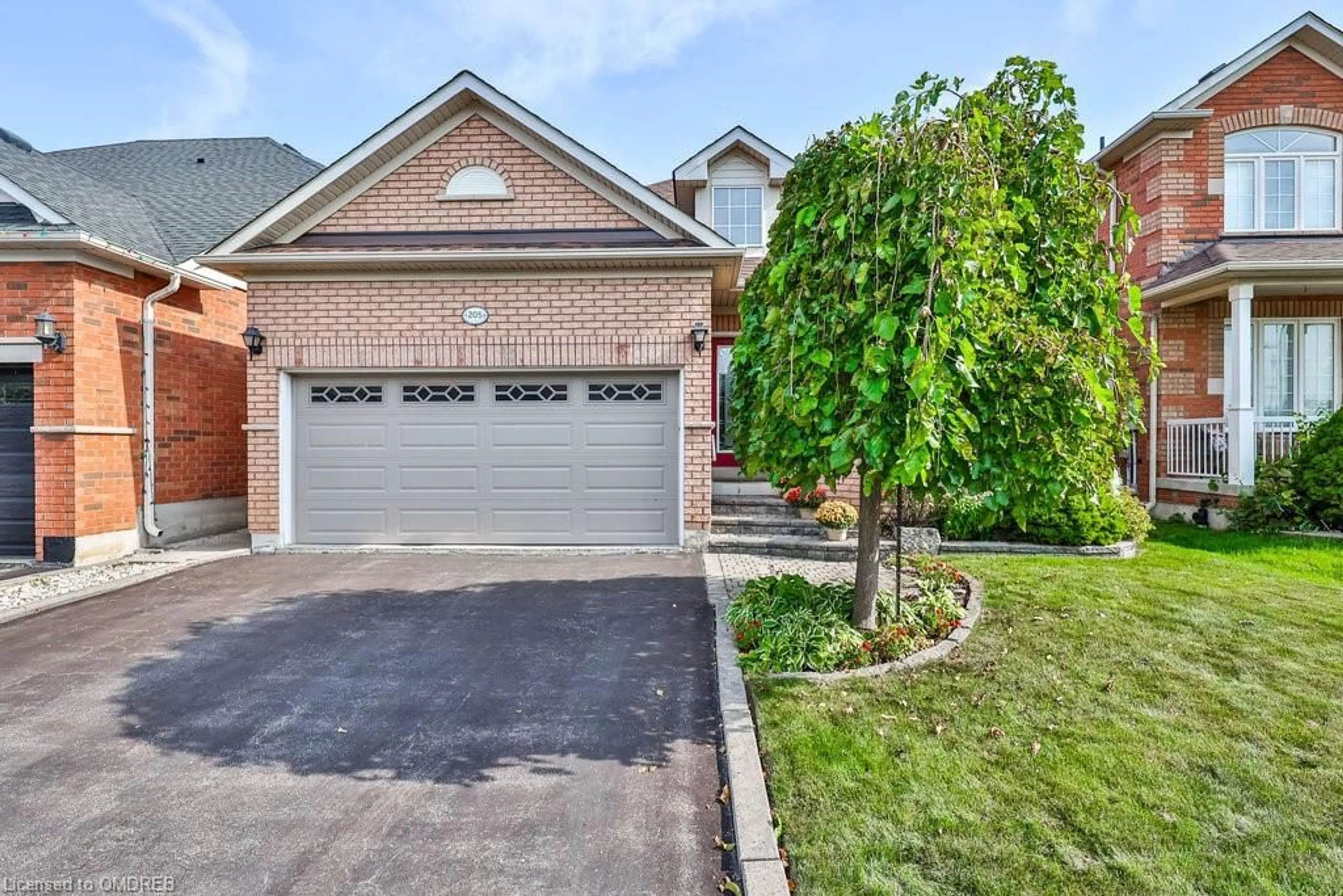 Home with brick exterior material for 205 Ellis Cres, Milton Ontario L9T 6B5