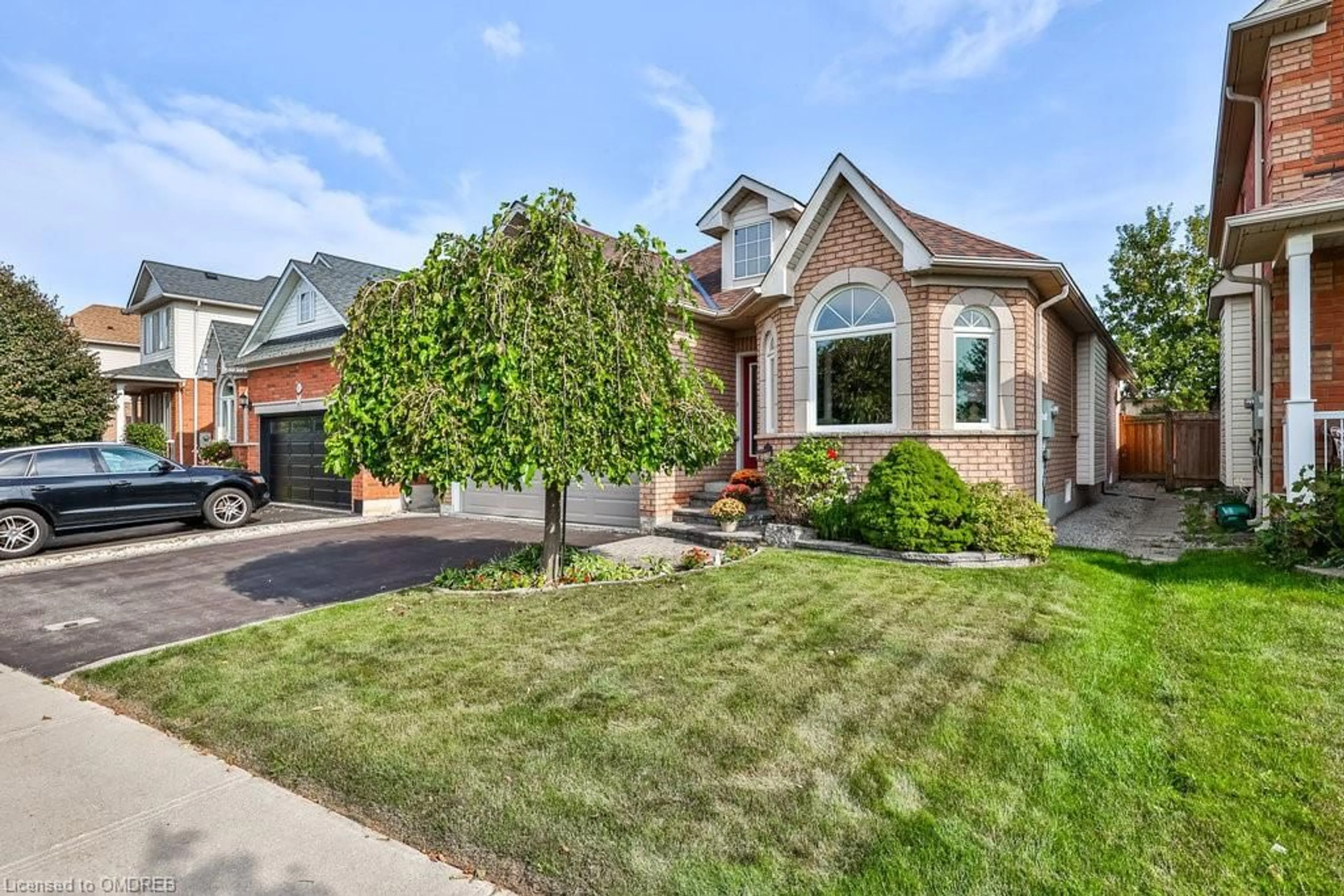 Frontside or backside of a home for 205 Ellis Cres, Milton Ontario L9T 6B5