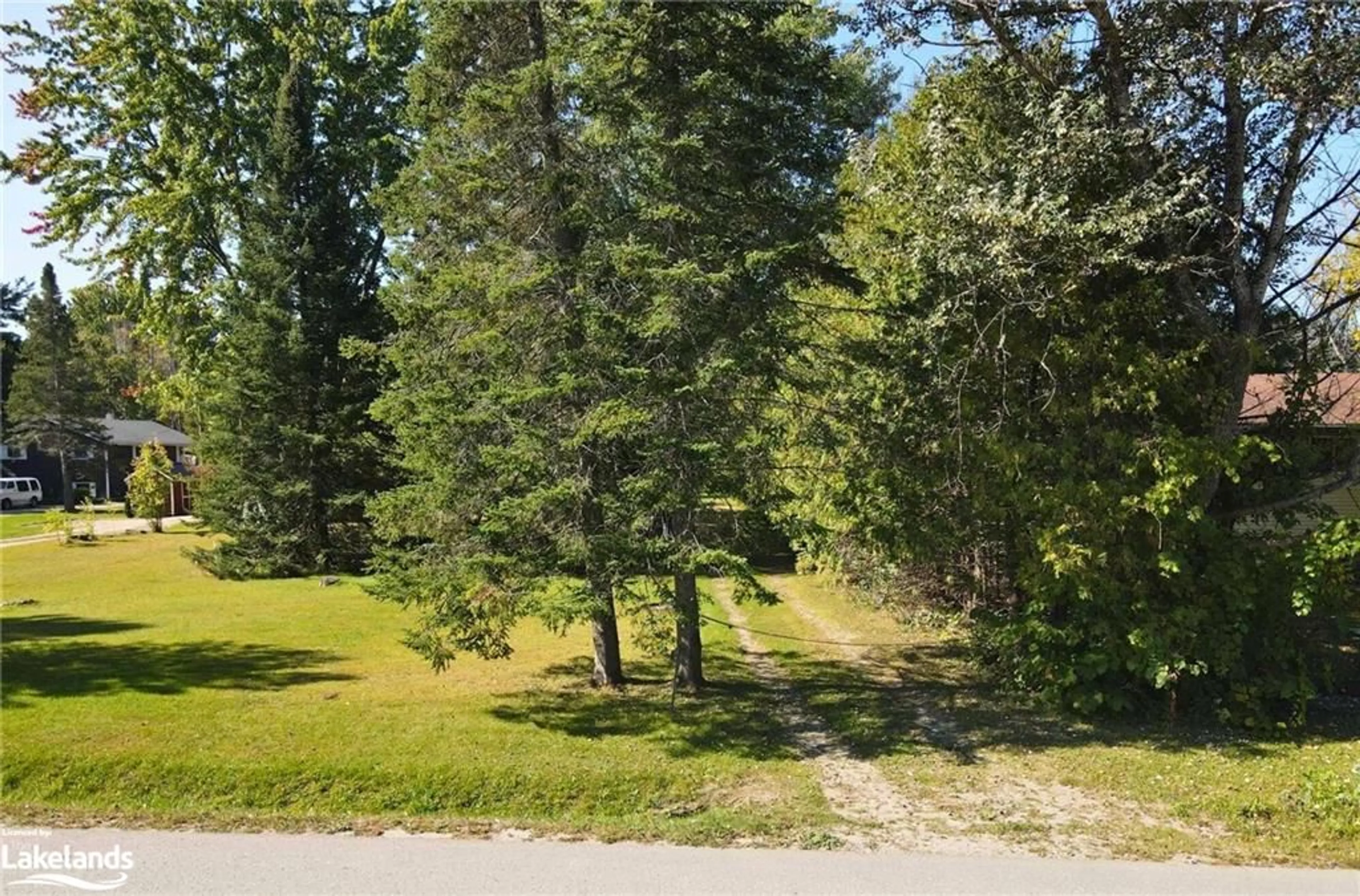 A pic from exterior of the house or condo, the fenced backyard for 1968 Rosemount Road, Waubaushene Ontario L0K 2C0