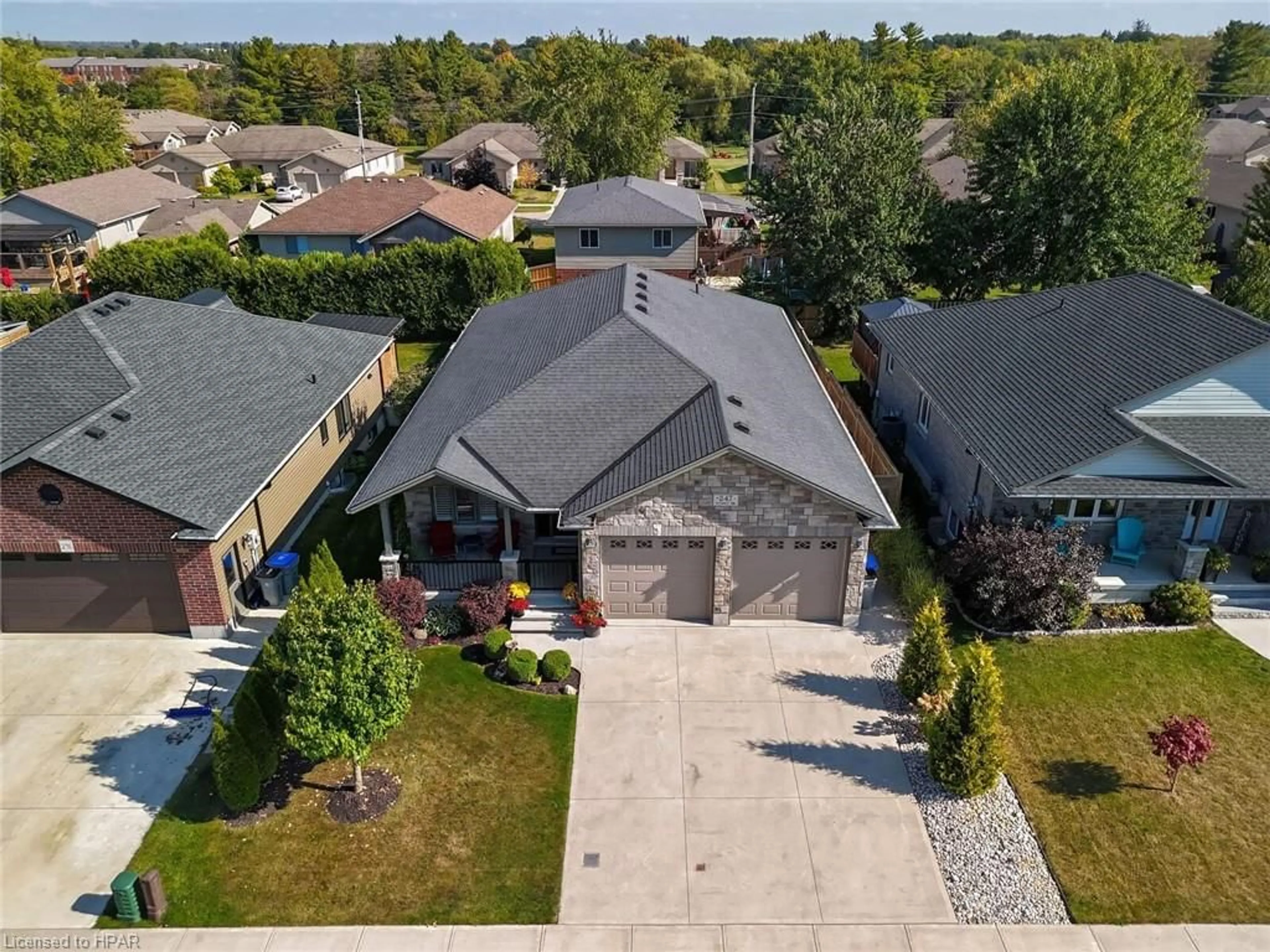 Frontside or backside of a home, the street view for 247 Sunset Dr, Mitchell Ontario N0K 1N0