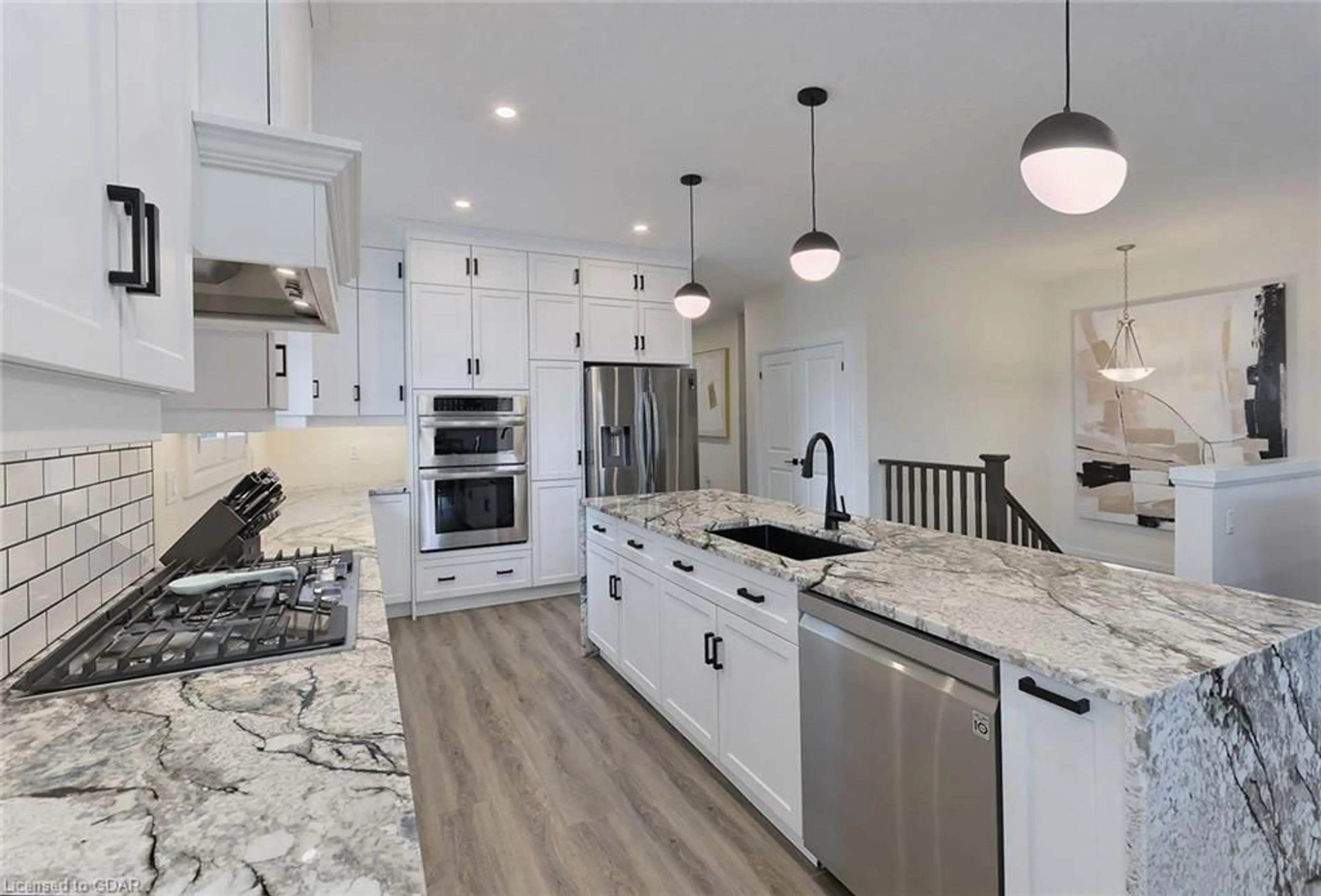 Open concept kitchen for 129 Walsh St, Arthur Ontario N0G 1A0