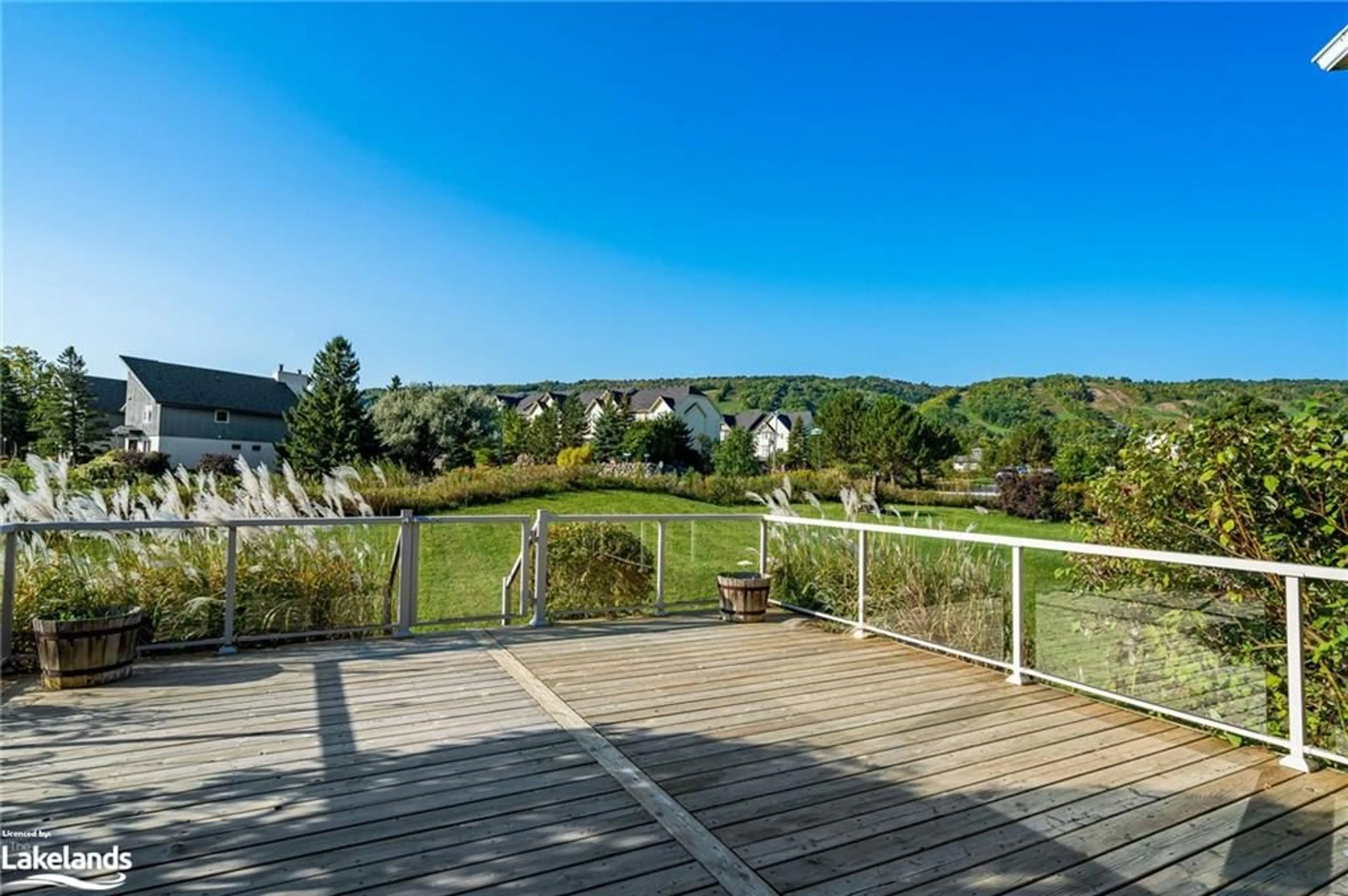 Patio, the fenced backyard for 106 Crossan Crt, The Blue Mountains Ontario L9Y 0M3