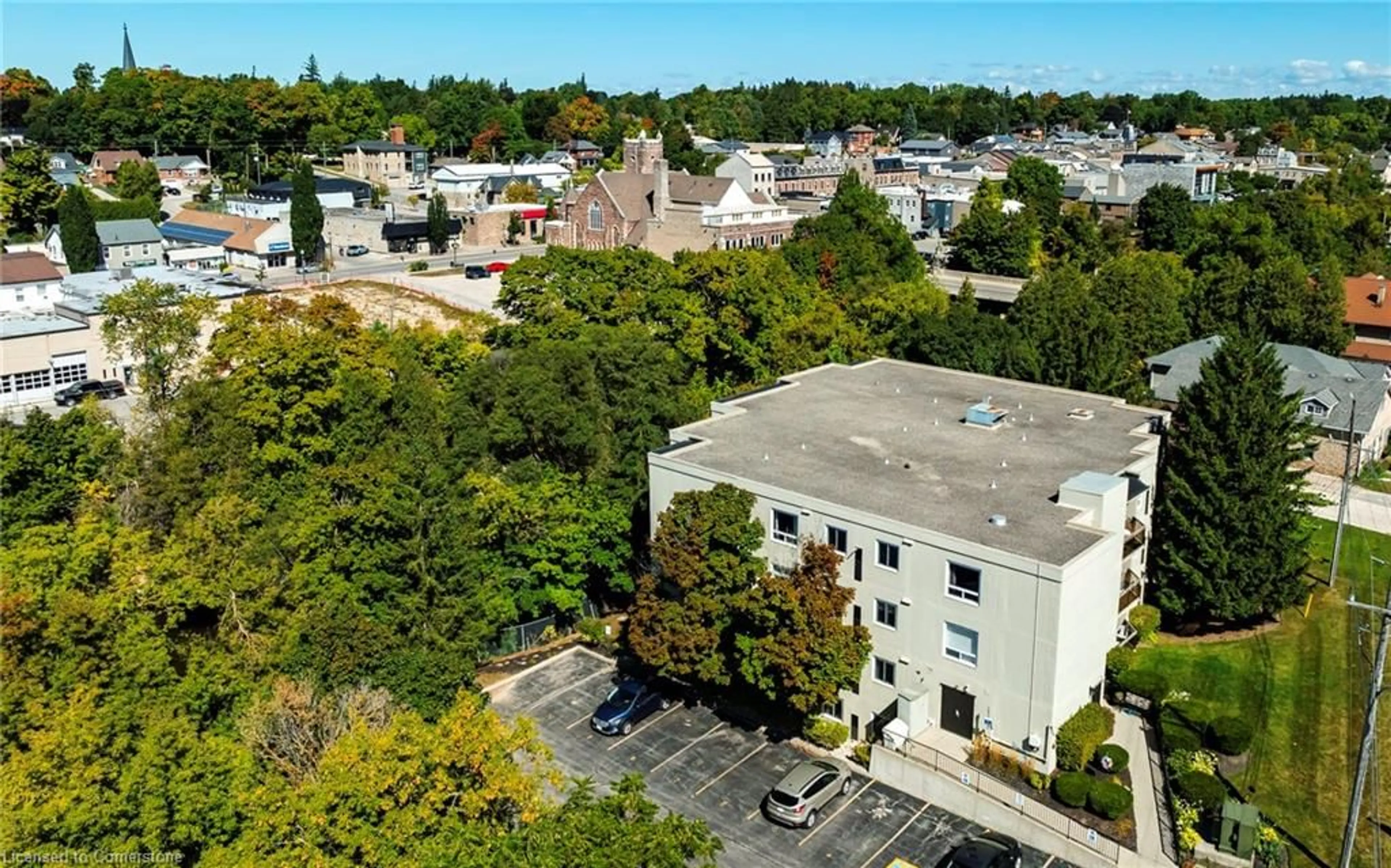 A pic from exterior of the house or condo, the street view for 245 Queen St #101, Fergus Ontario N1M 3R6