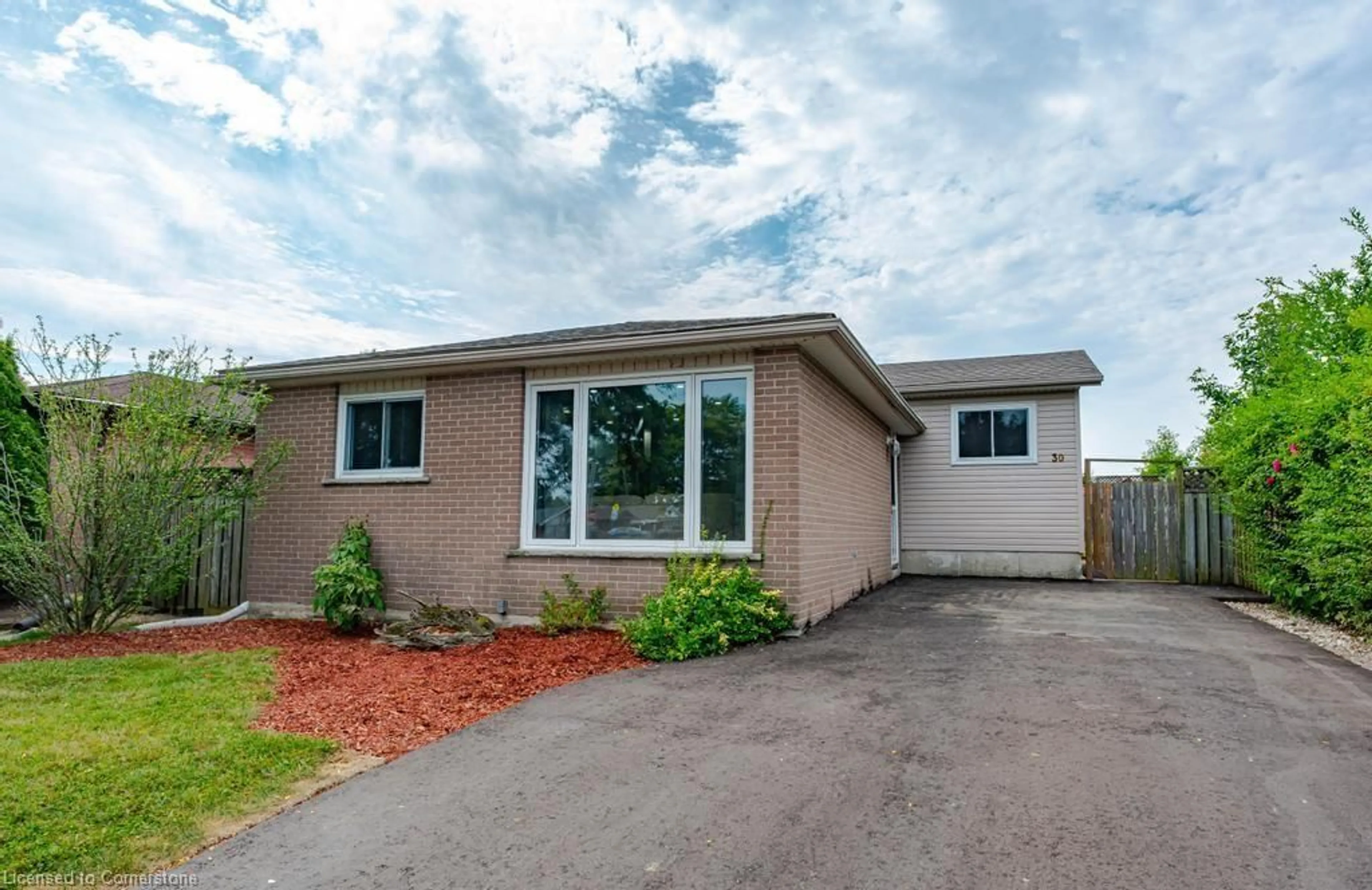 Frontside or backside of a home for 30 Larch St, Hamilton Ontario L8T 4N9