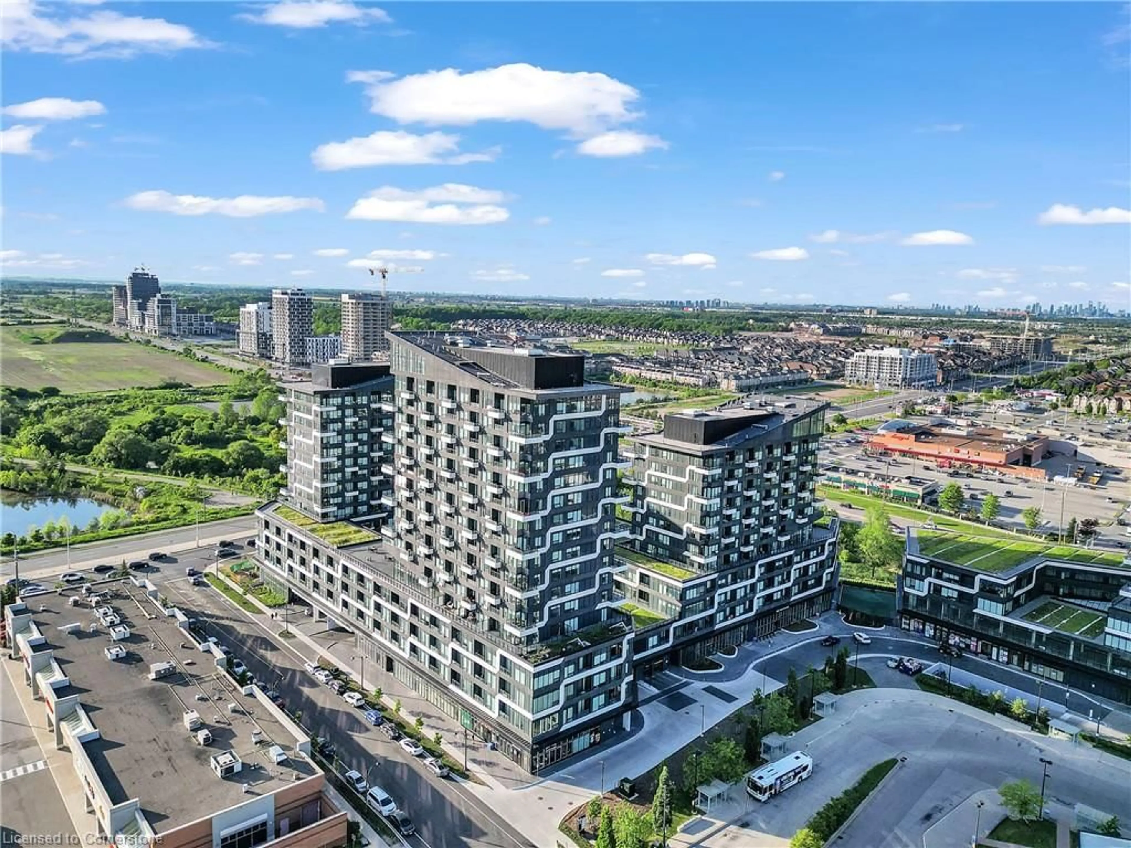 A pic from exterior of the house or condo, the view of city buildings for 2481 Taunton Road Rd #704, Oakville Ontario L6H 3R7