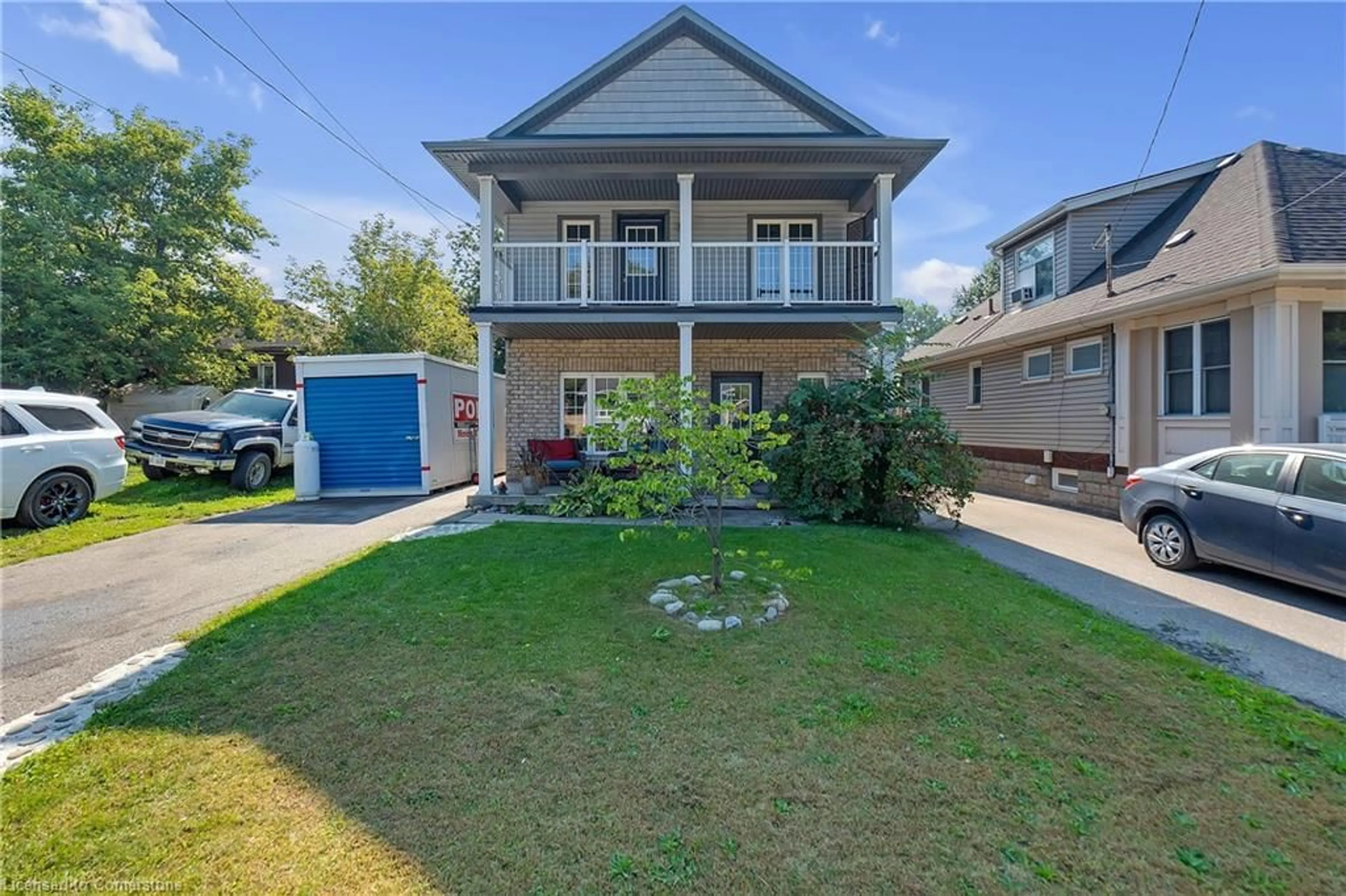 Frontside or backside of a home, the fenced backyard for 2 Comet Ave, Hamilton Ontario L8H 7E5