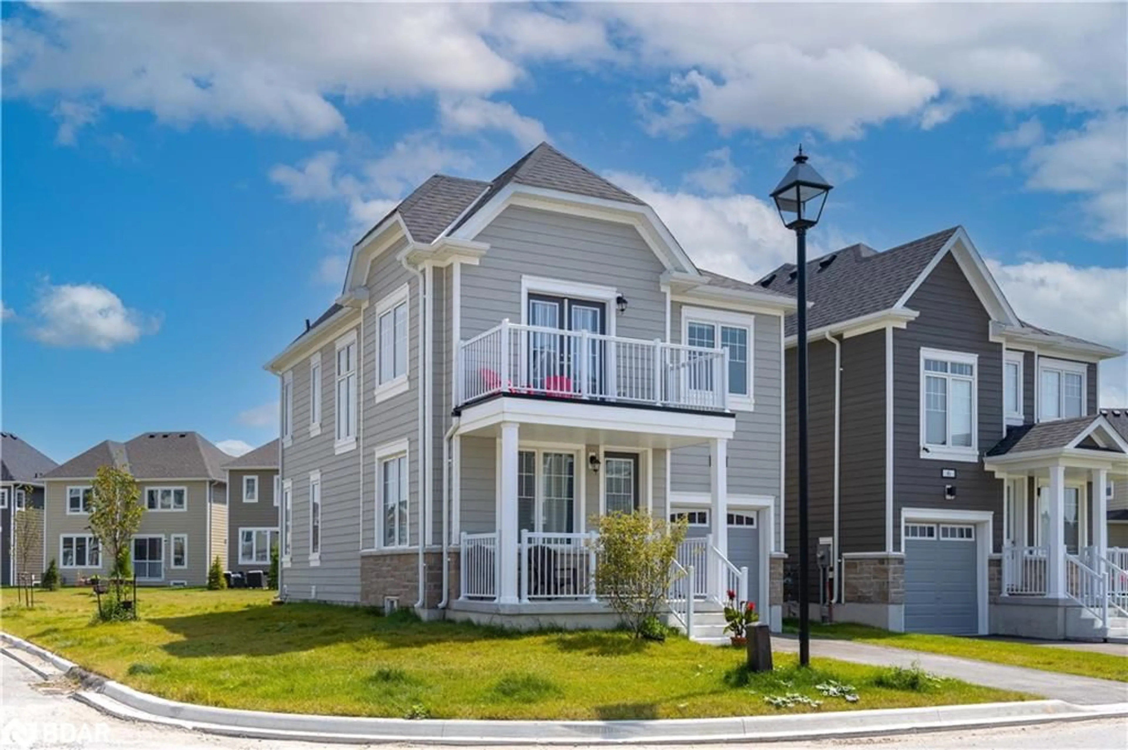 A pic from exterior of the house or condo, the street view for 4 Courtland Way, Wasaga Beach Ontario L9Z 0K2